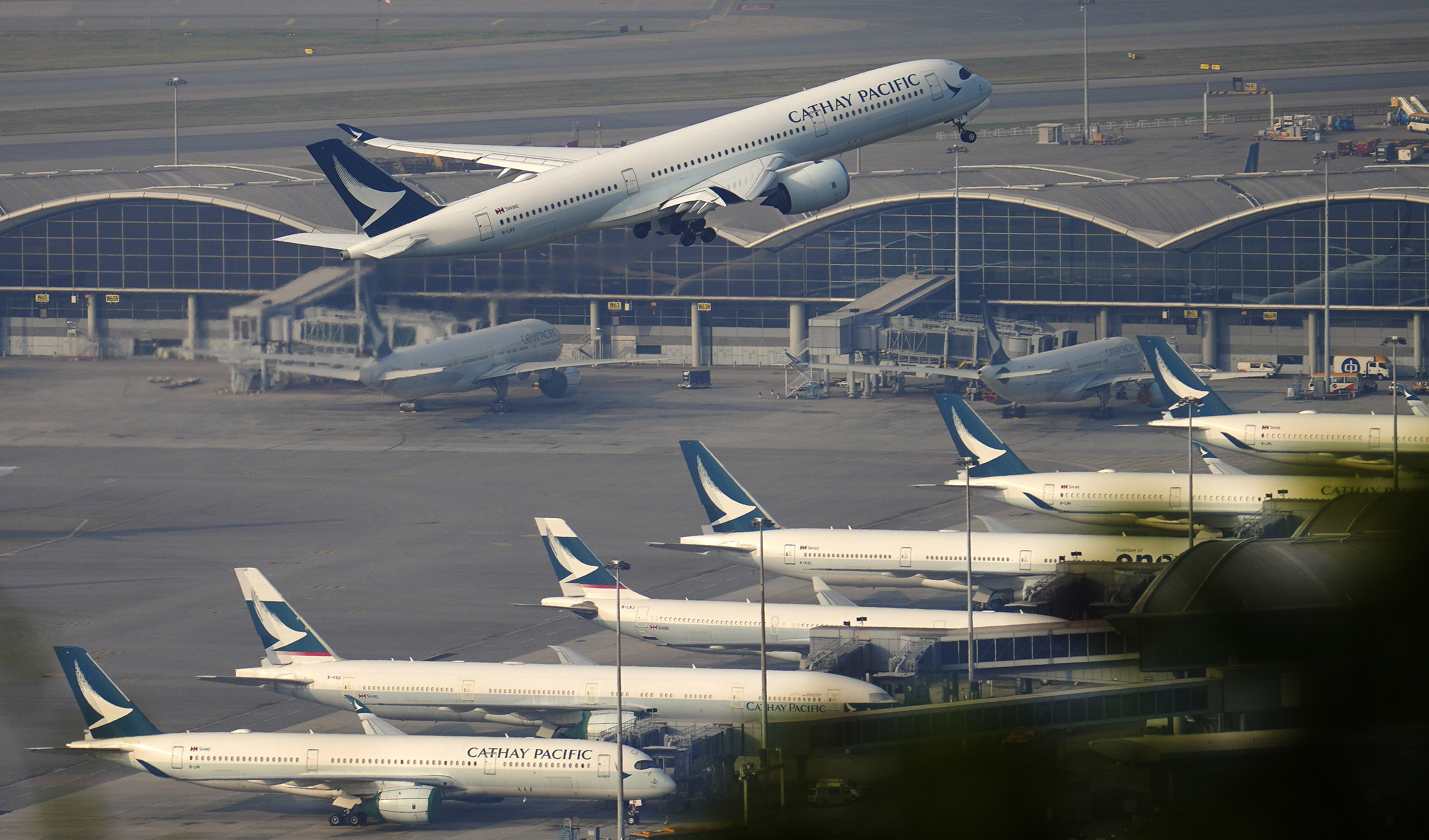 International air travel is returning to pre-pandemic levels, but a number of previously popular direct flights serving Hong Kong International Airport (above) have not restarted. Photo: Sam Tsang