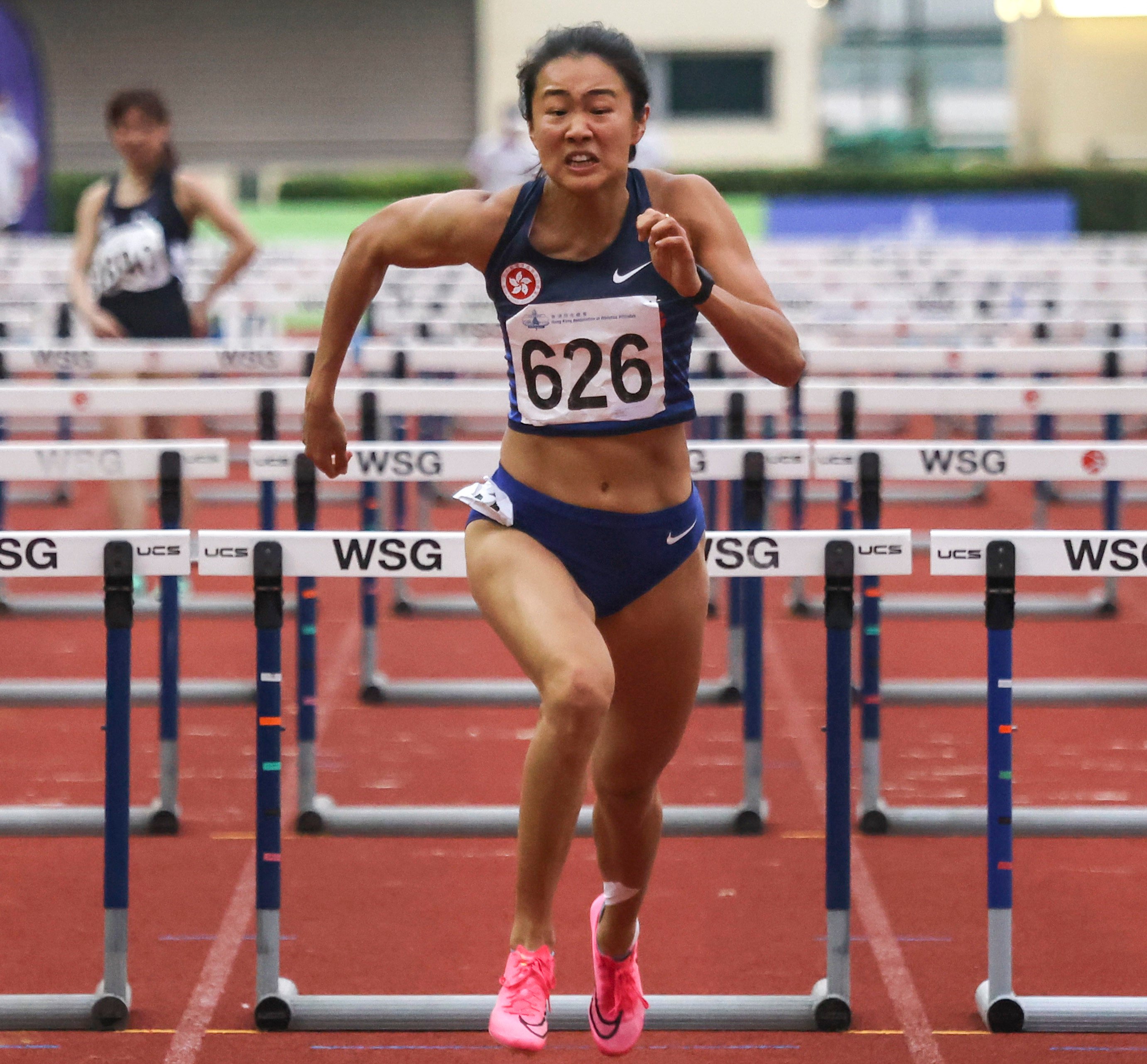 The 2023 Hong Kong Athletics Championships women’s 100m hurdles winner Vera Lui Lai-yiu in action at Wan Chai Sports Ground. Photo: Jonathan Wong