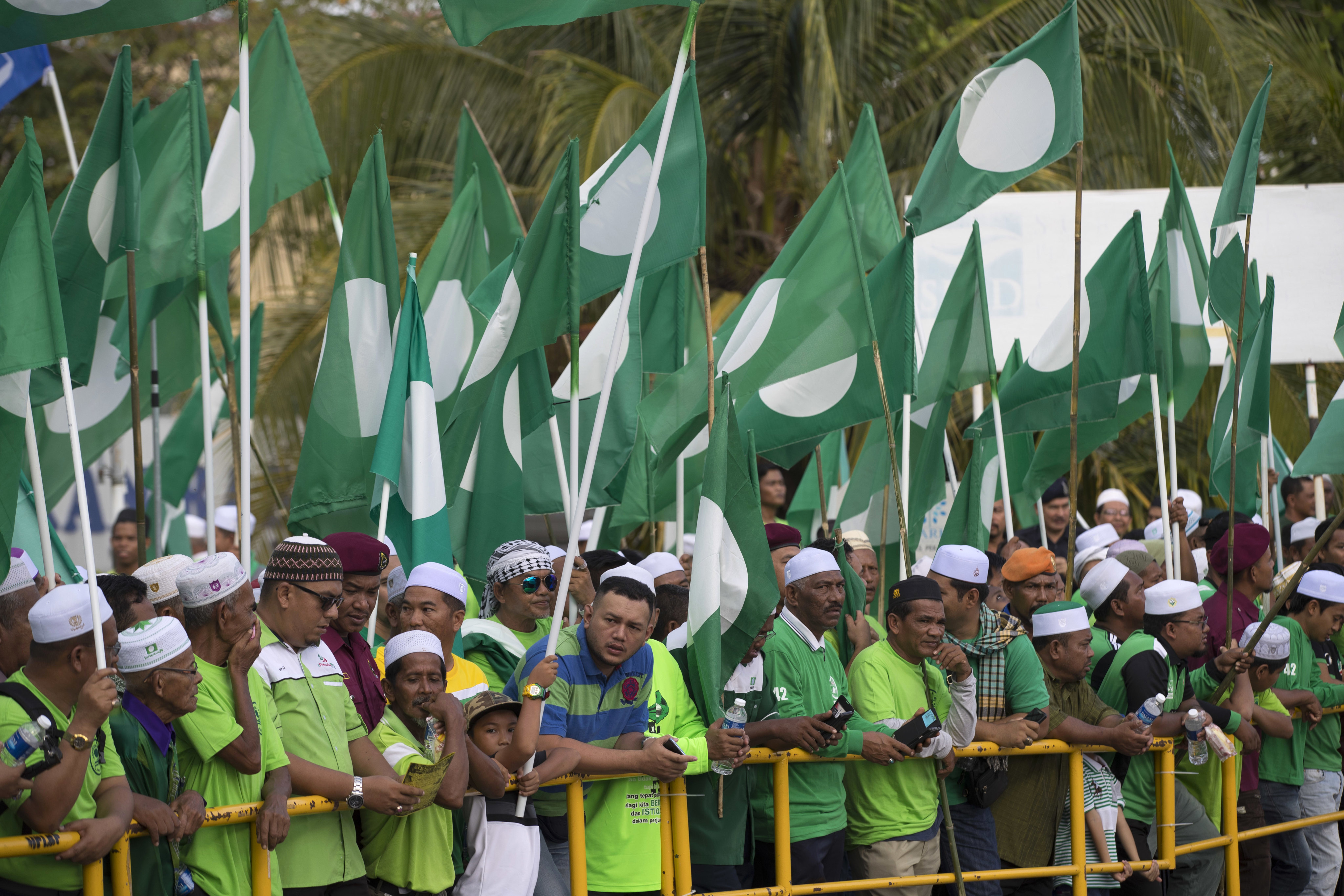 PAS supporters gather outside a nomination centre in Langkawi on election nomination day outside in 2018. Photo: AP