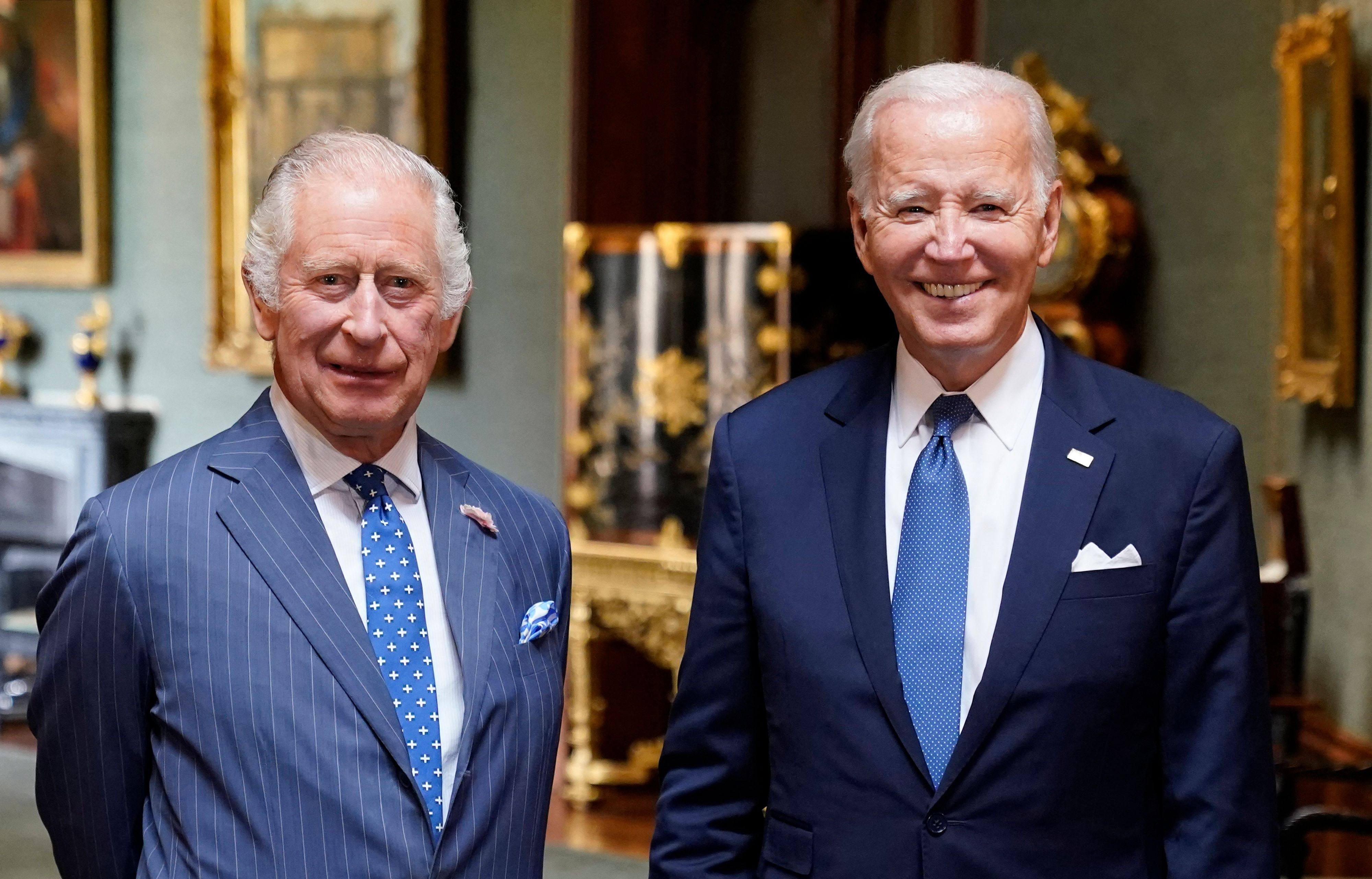 Britain’s King Charles III and US President Joe Biden in the Grand Corridor at Windsor Castle in Windsor. Photo: AFP