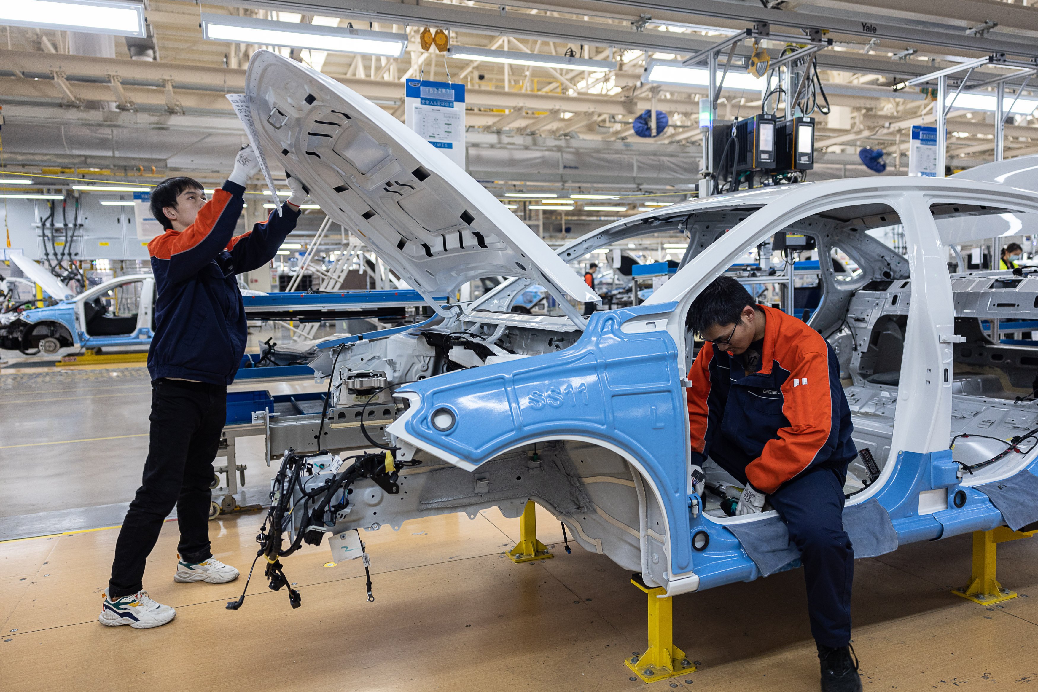 A Geely Auto assembly line in Huzhou, in China’s Zhejiang province. The new venture, which does not have an official name yet, will have 17 plants and 19,000 employees. Photo: Getty Images