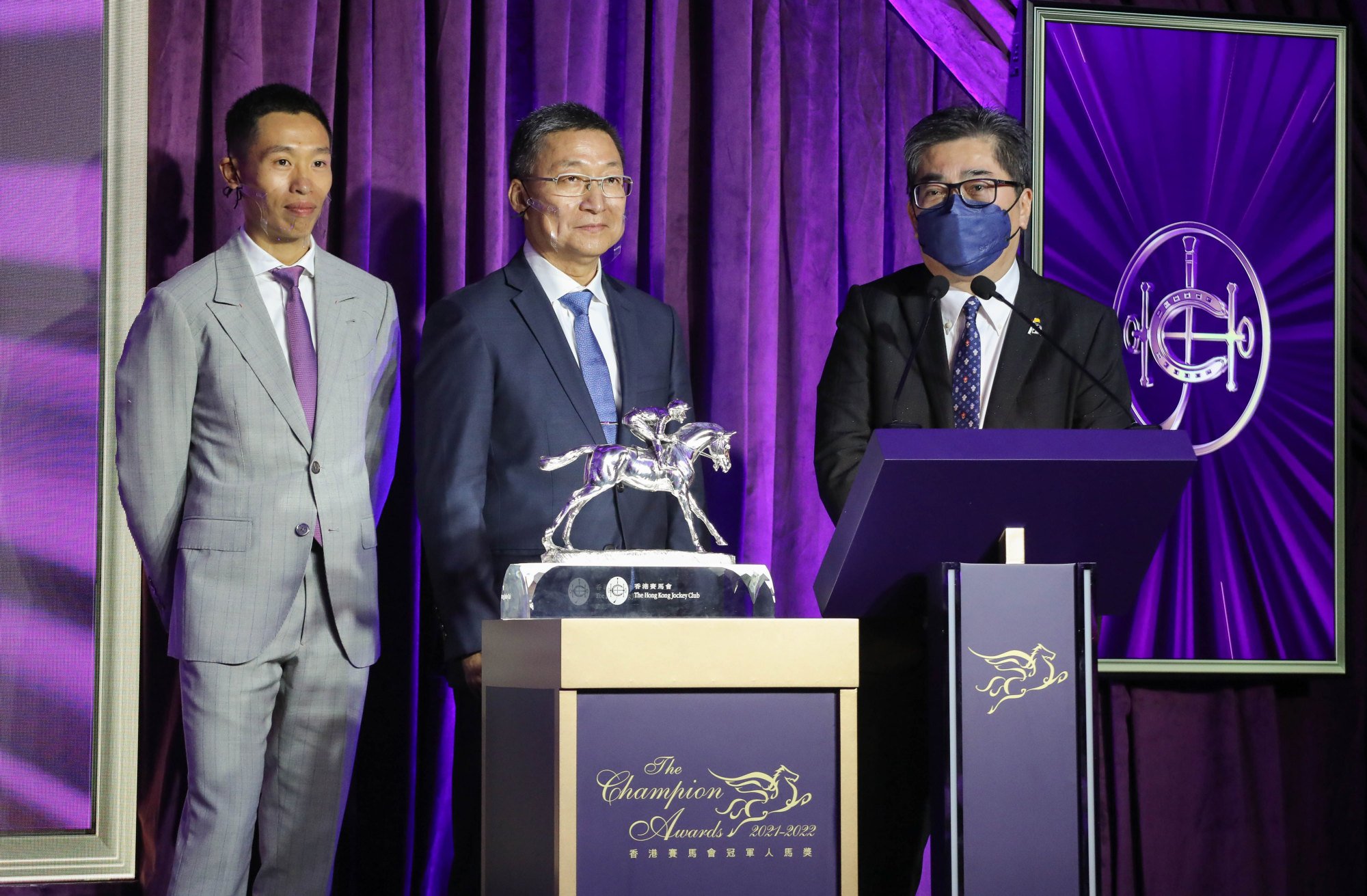 Jockey Vincent Ho (left), trainer Francis Lui and owner Stanley Chan with Golden Sixty’s 2022 Horse of the Year spoils.
