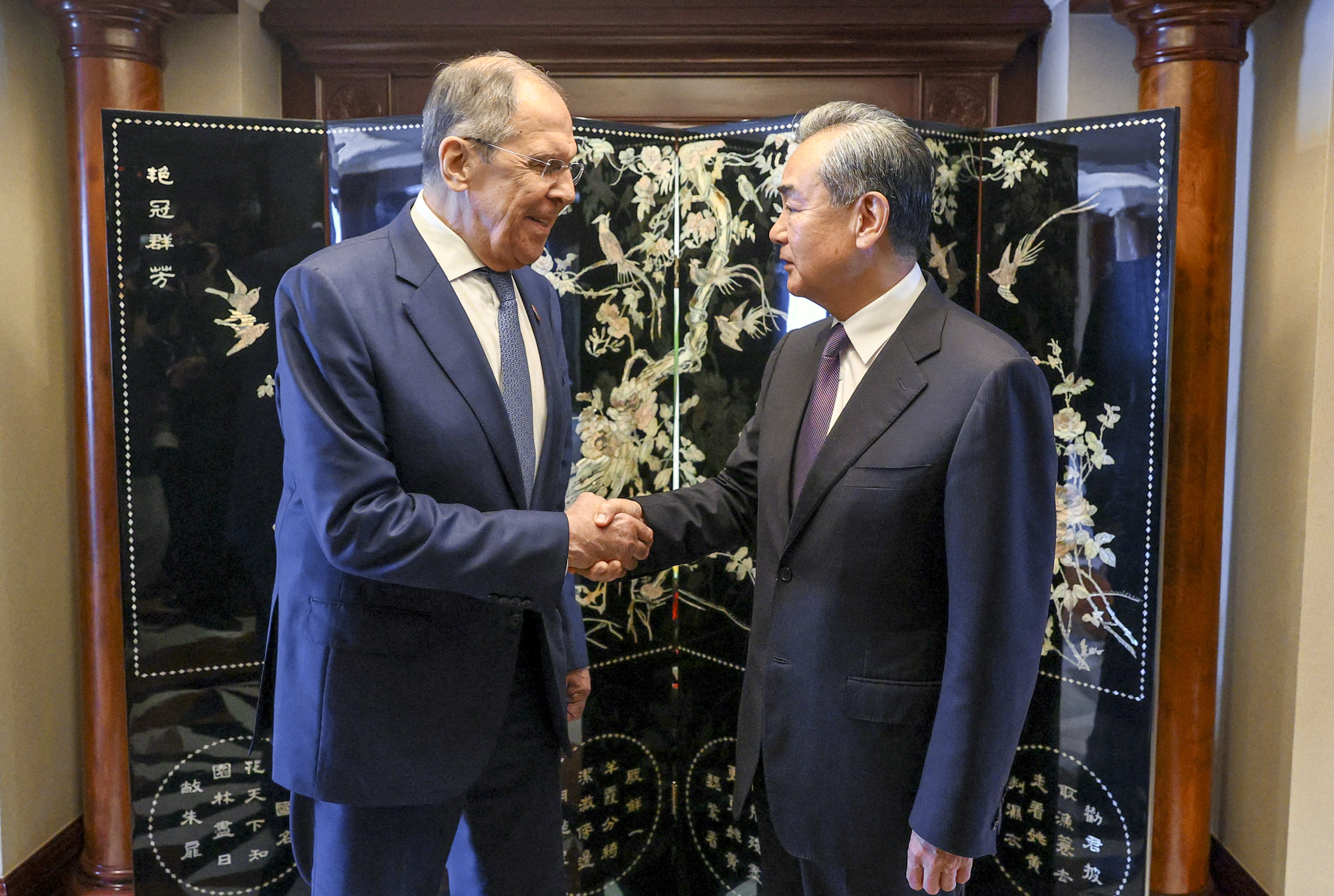 Russian Foreign Minister Sergey Lavrov meets Wang Yi, China’s top diplomat, in Jakarta on Thursday. Photo: Handout via Reuters