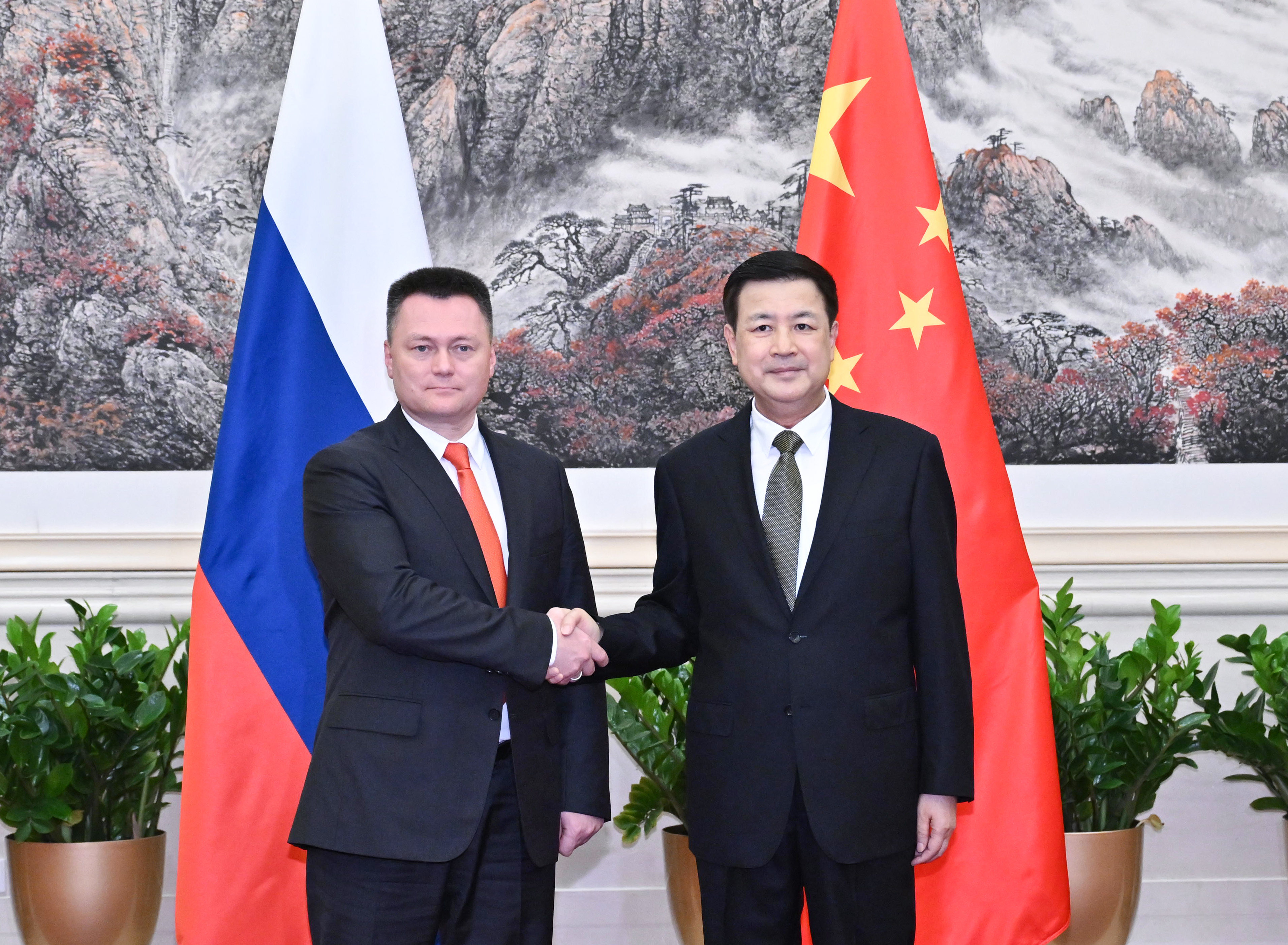 Chinese Minister of Public Security Wang Xiaohong (right) with Russian Prosecutor General Igor Krasnov in Beijing on Thursday. Photo: Xinhua