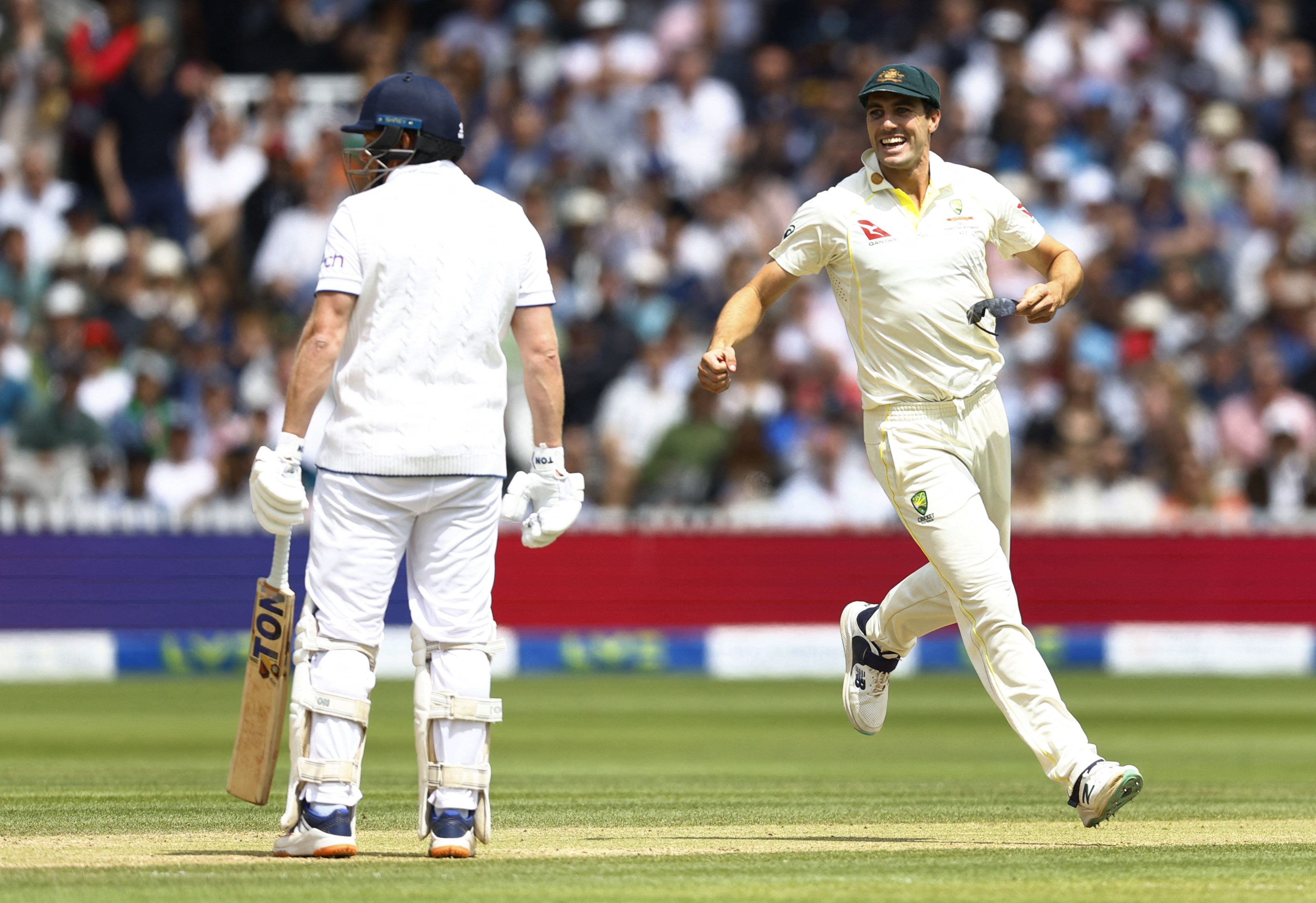 Australia’s Pat Cummins celebrates after England’s Jonny Bairstow was run out, having left his crease thinking, wrongly, that the bowler had finished his over during the second match of the England vs Australia test cricket series. English fans said it wasn’t fair play. Photo: Action Images via Reuters
