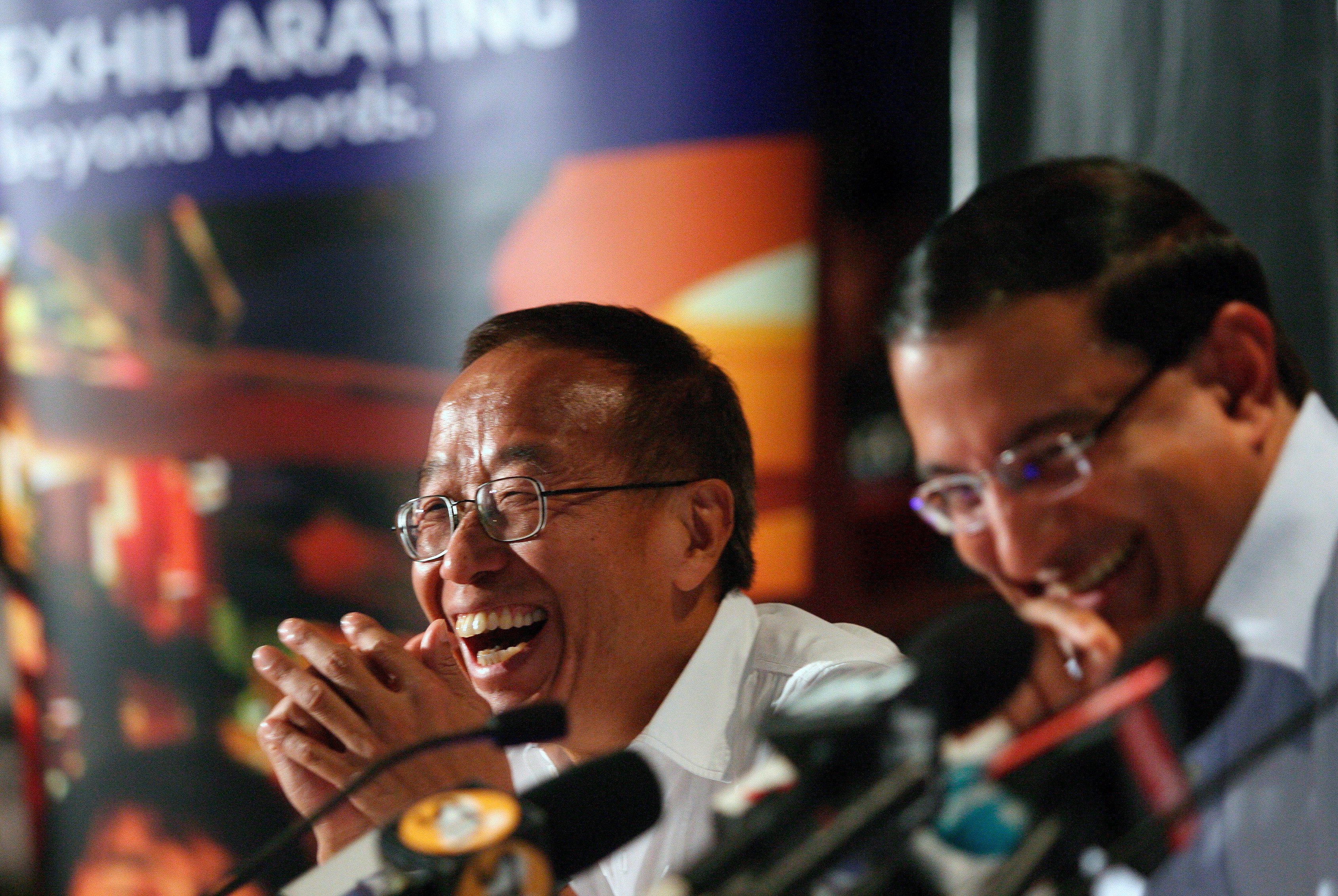 Billionaire Ong Beng Seng (left) and Singapore minister S Iswaran in 2007. Photo: EPA-EFE