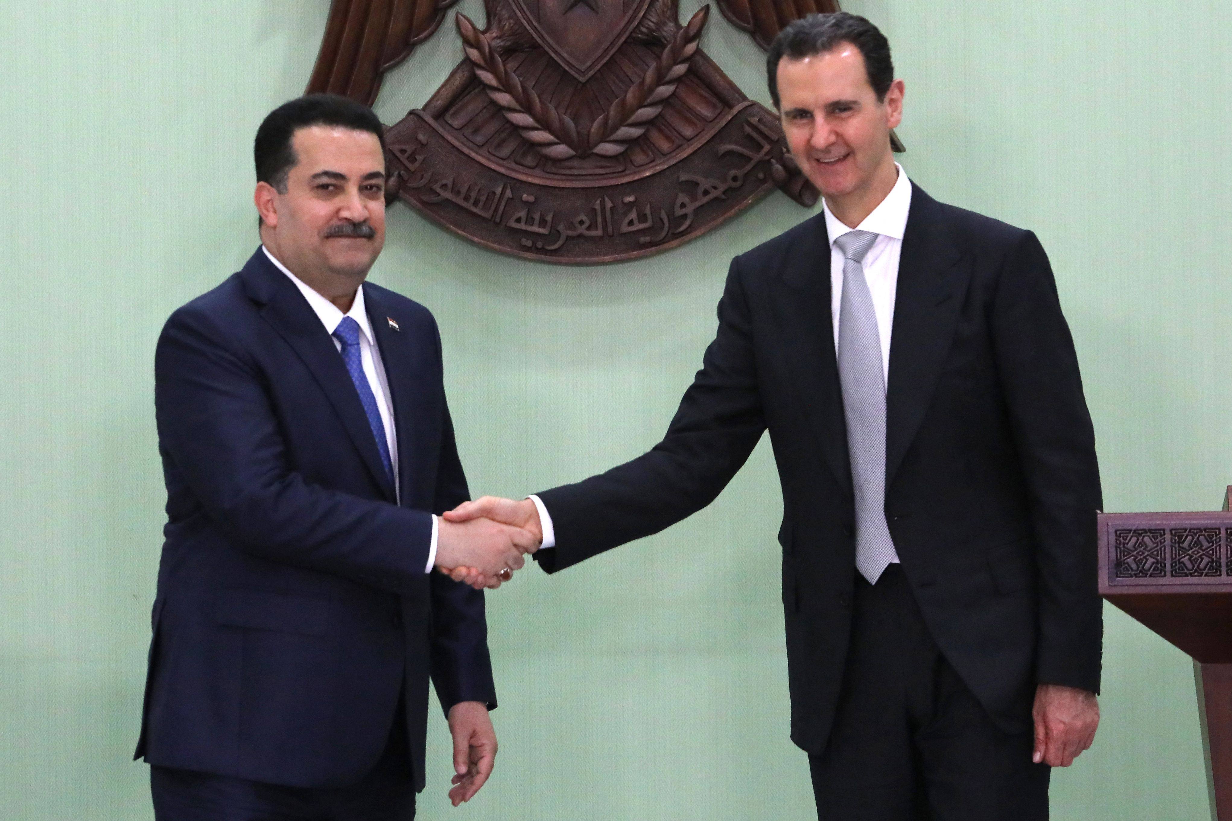 Iraq’s Prime Minister Mohamed Shia al-Sudani, left and Syria’s President Bashar al-Assad in Damascus. Photo: AFP