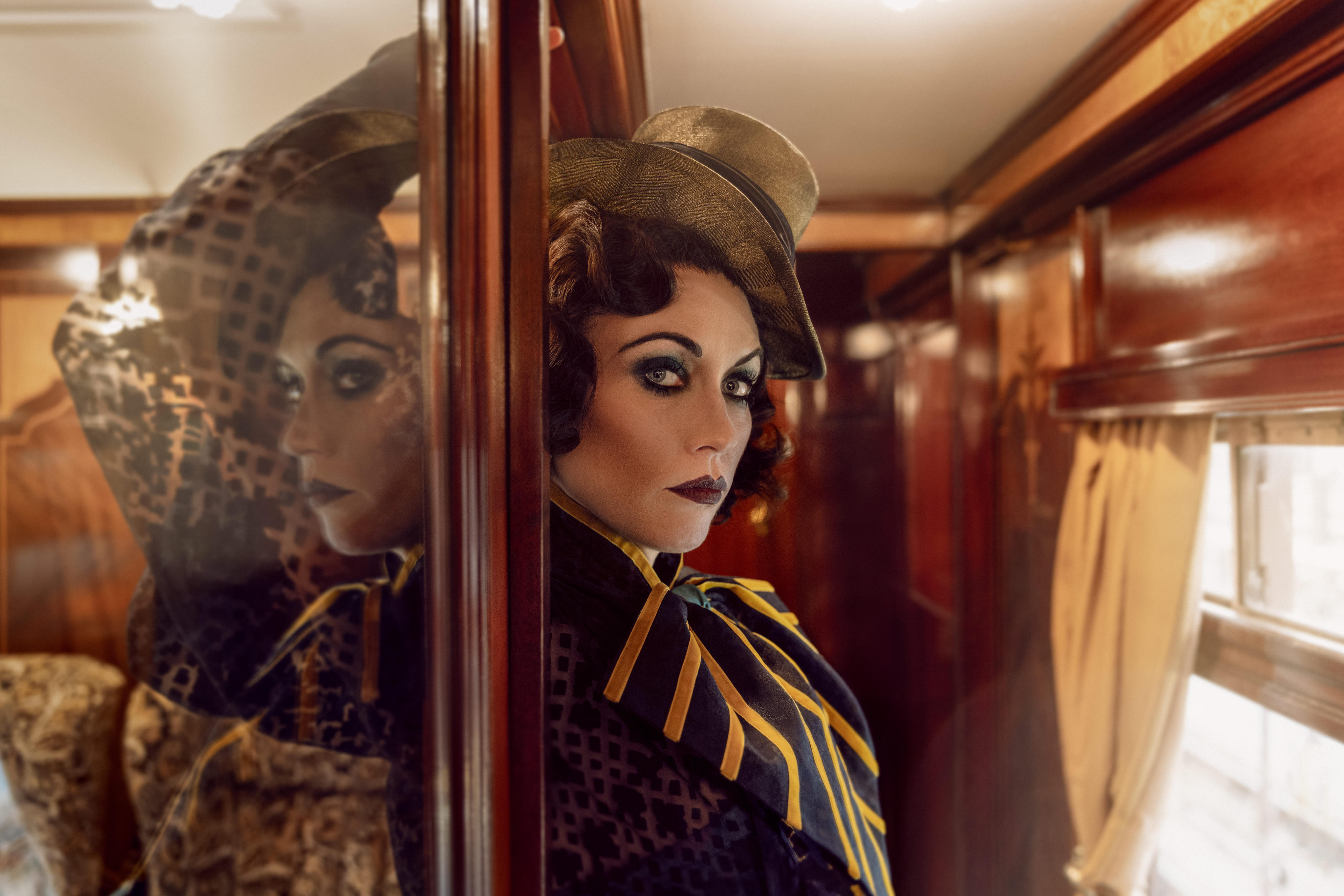 “Julie Ibis” in A Moving Murder Mystery, an experience onboard a luxury British Pullman train that travels from London to Dover and back. Photo: Private Drama Events / The Other Richard