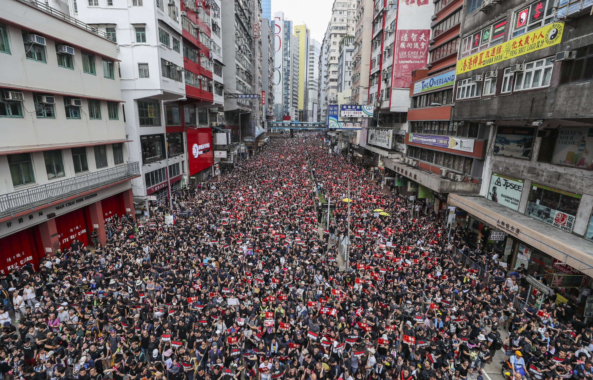 Protesters flood a road in Causeway Bay at the height of the anti-government movement in June of 2019. The campaign would later yield “blue” and “yellow” business circles, alluding to shops and their political leanings. Photo: Sam Tsang