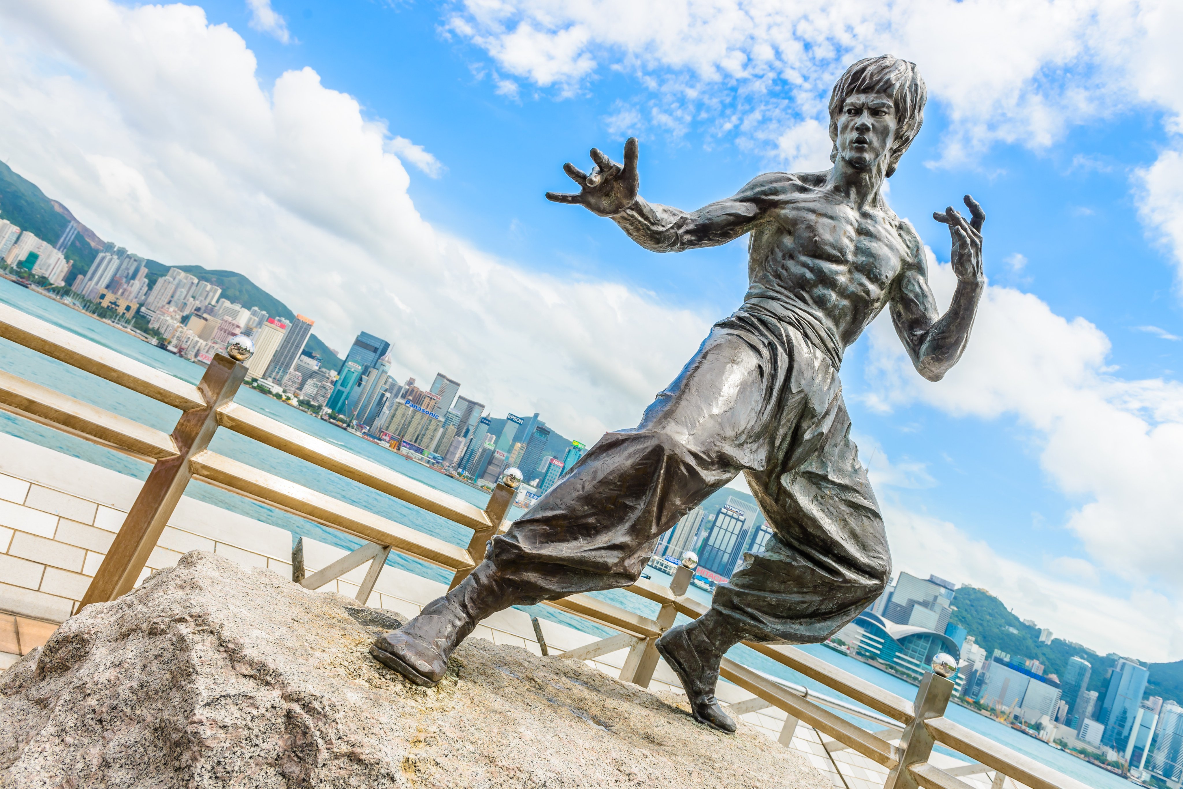 Hong Kong has embraced Bruce Lee as a native son. Pictured is a statue of the martial arts star and actor near the Tsim Sha Tsui waterfront in the city. Photo: Shutterstock
