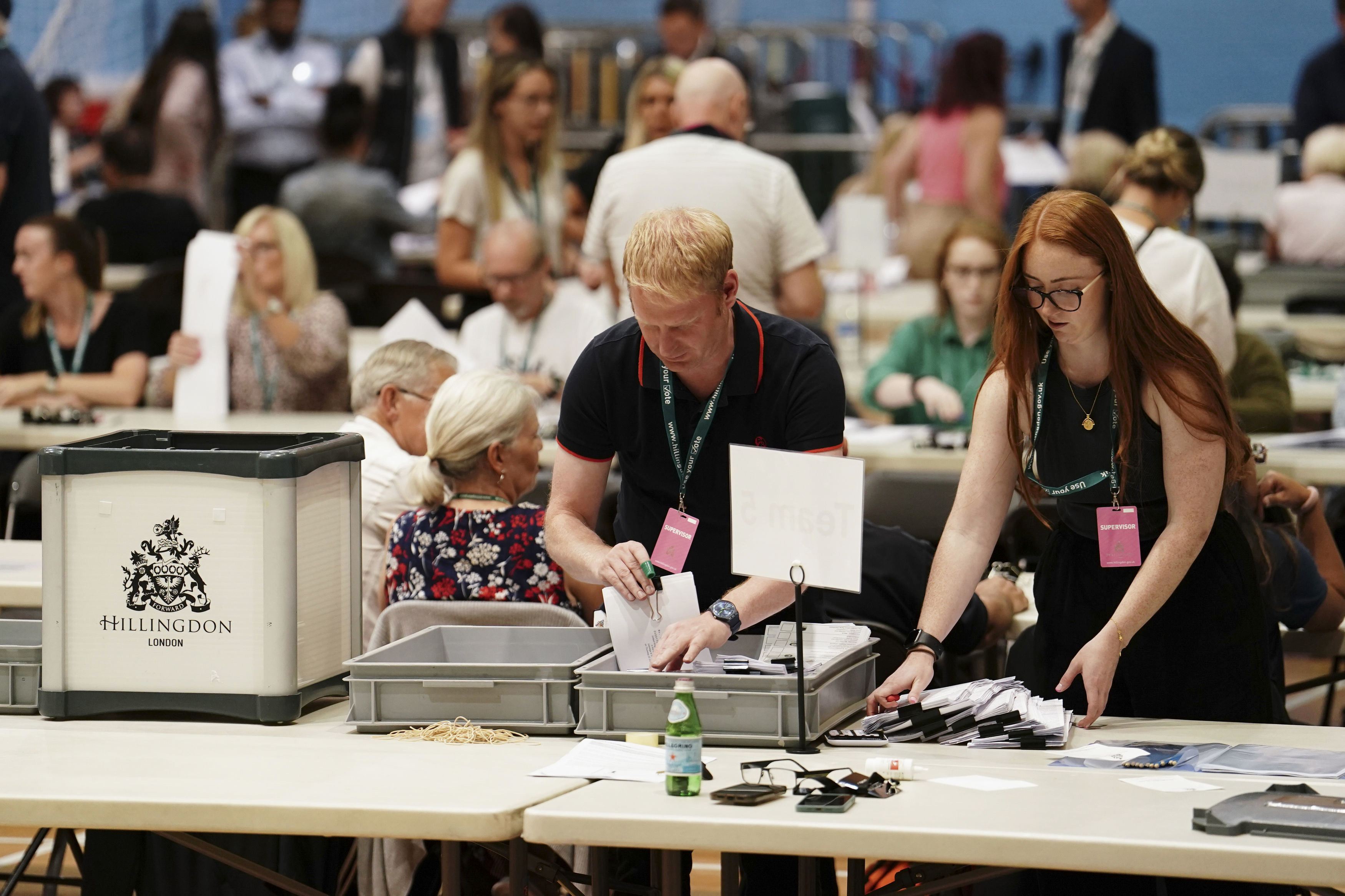 Ballots are counted at Queensmead Sports Centre in South Ruislip, west London, on July 20. Photo: PA via AP