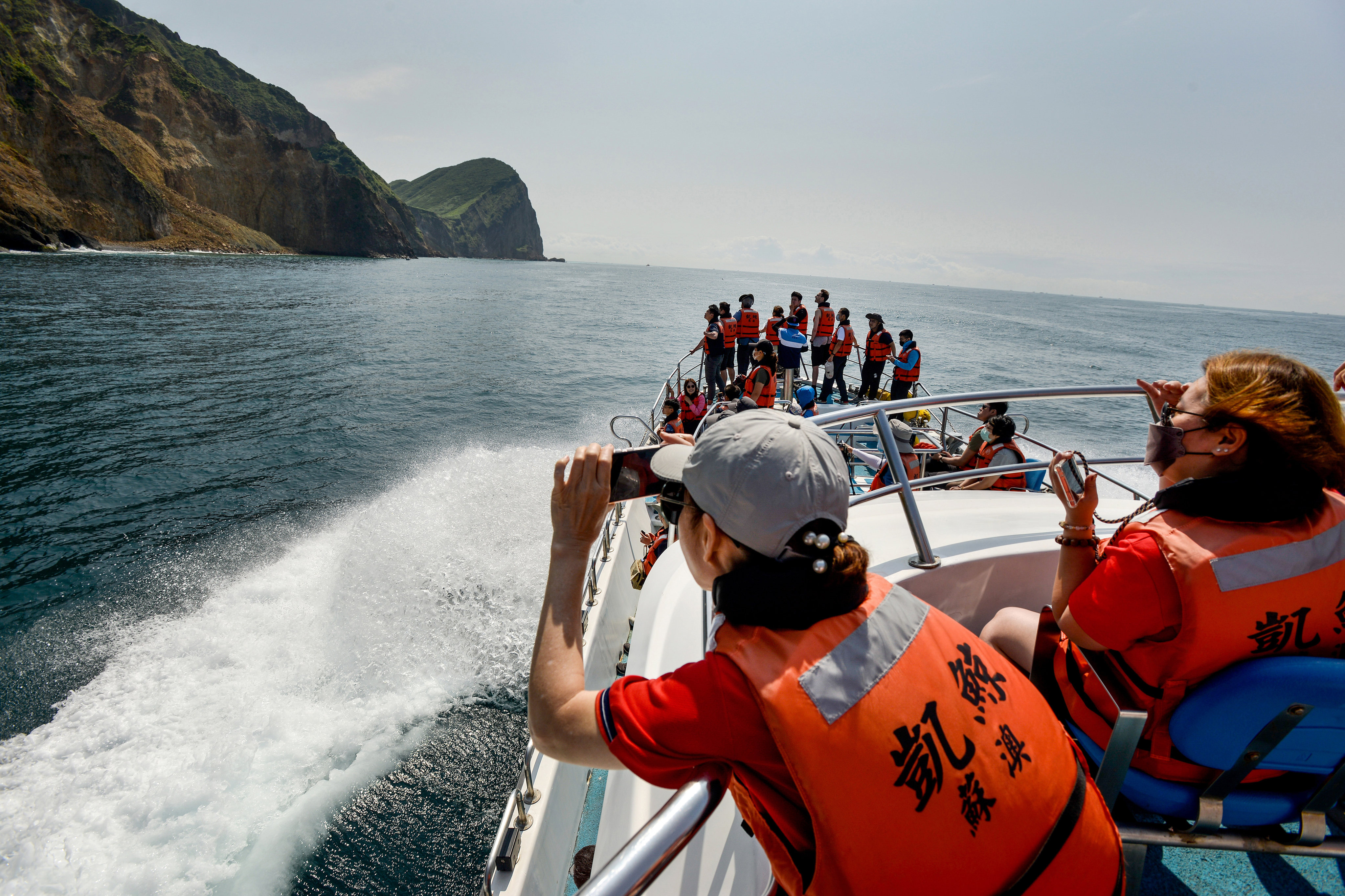 Tourists head to Taiwan’s Turtle Island on a cruise boat from Wushi Port in Toucheng. The area is popular with surfers and divers, and boasts some of Taiwan’s best beaches. Photo: Chris Stowers/Panos