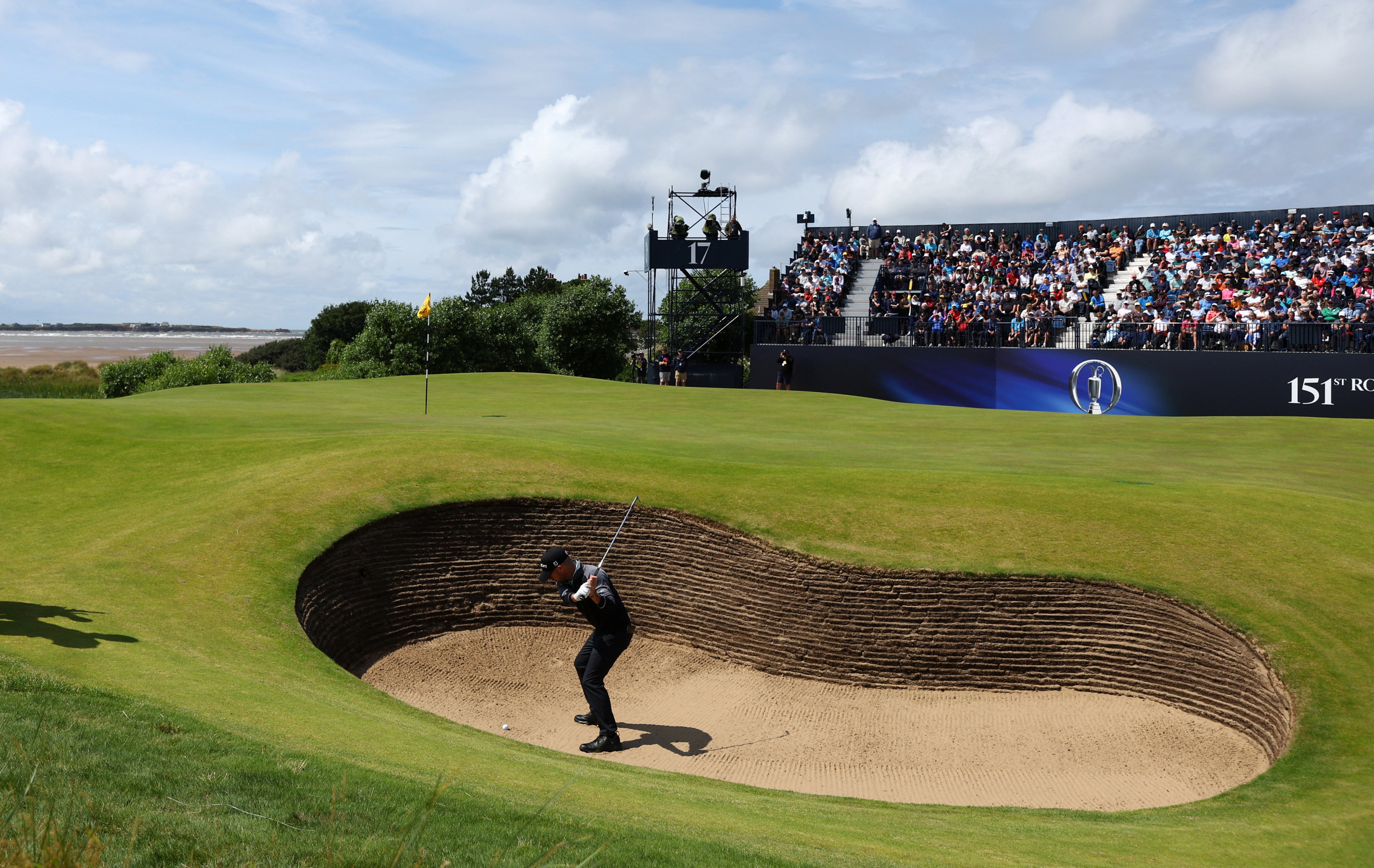 Brian Harman plays out of a bunker on the 17th hole during the second round of The Open Championship. Photo: Reuters