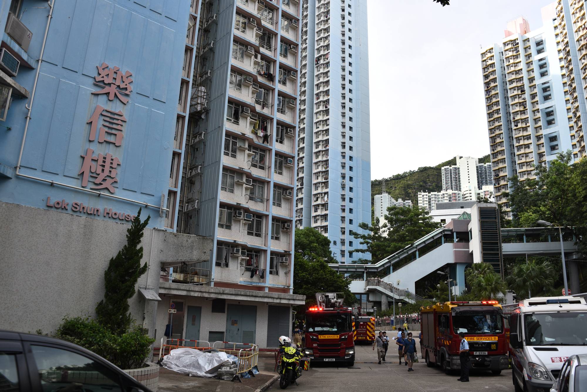 Property quarrel' led to Hong Kong flat fire, knife attack that