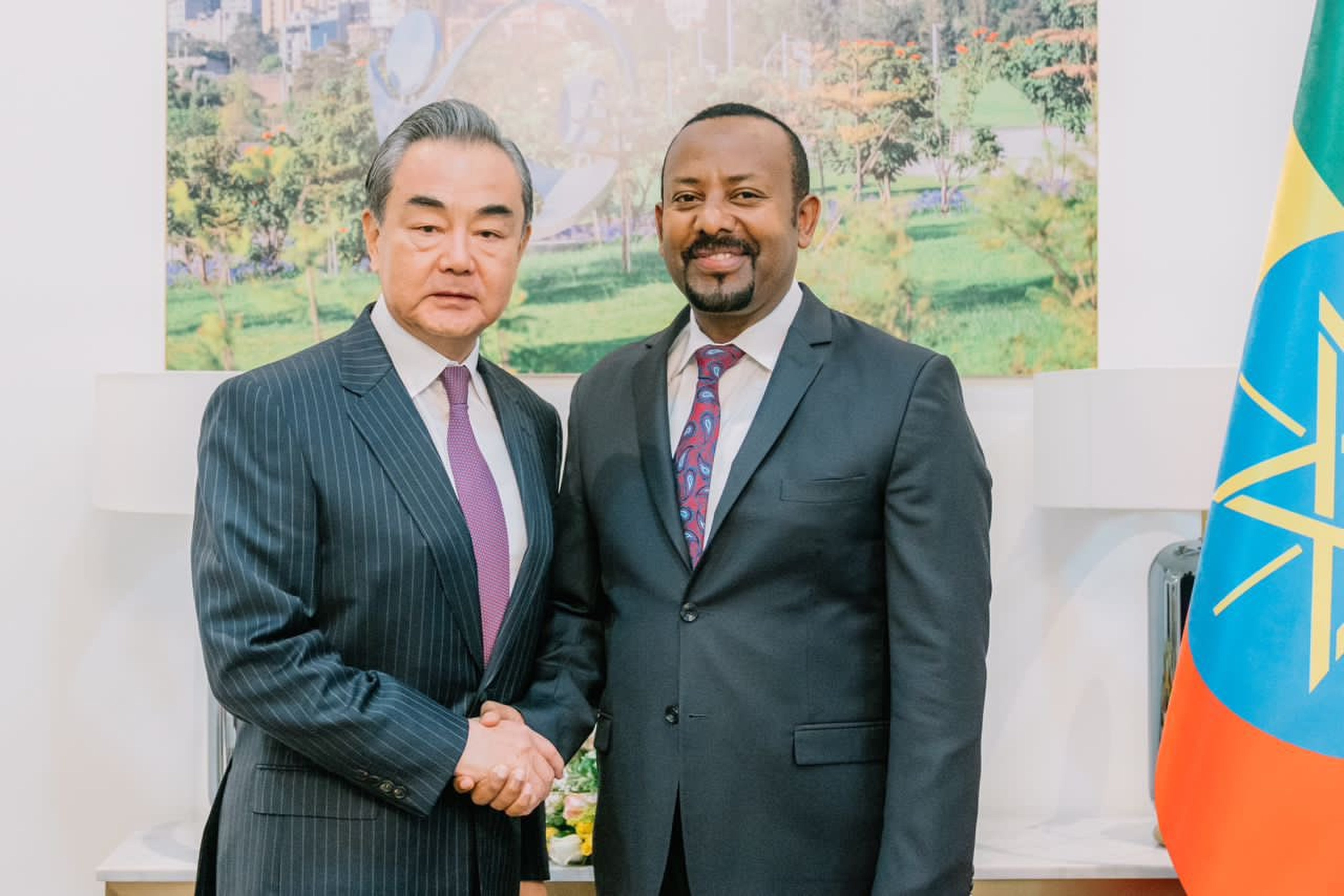 Ethiopian Prime Minister Abiy Ahmed meets senior Chinese diplomat Wang Yi for talks during a surprise stop in Addis Ababa. 