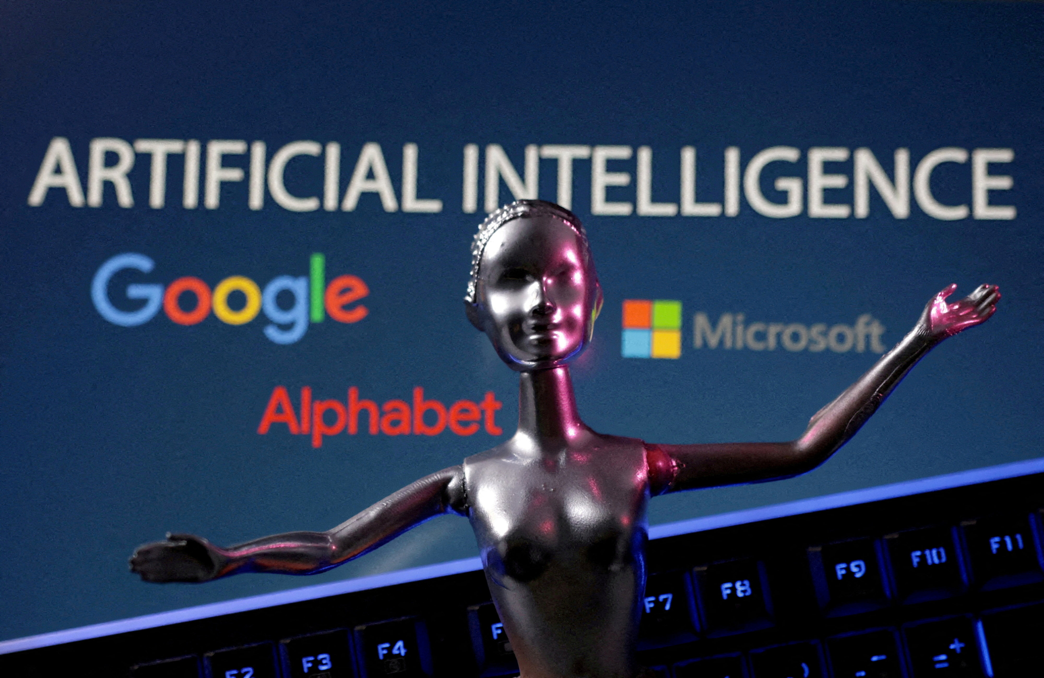 The Google, Microsoft and Alphabet logos, with artificial intelligence wording, are seen in this illustration picture taken, May 4, 2023. Photo: Reuters
