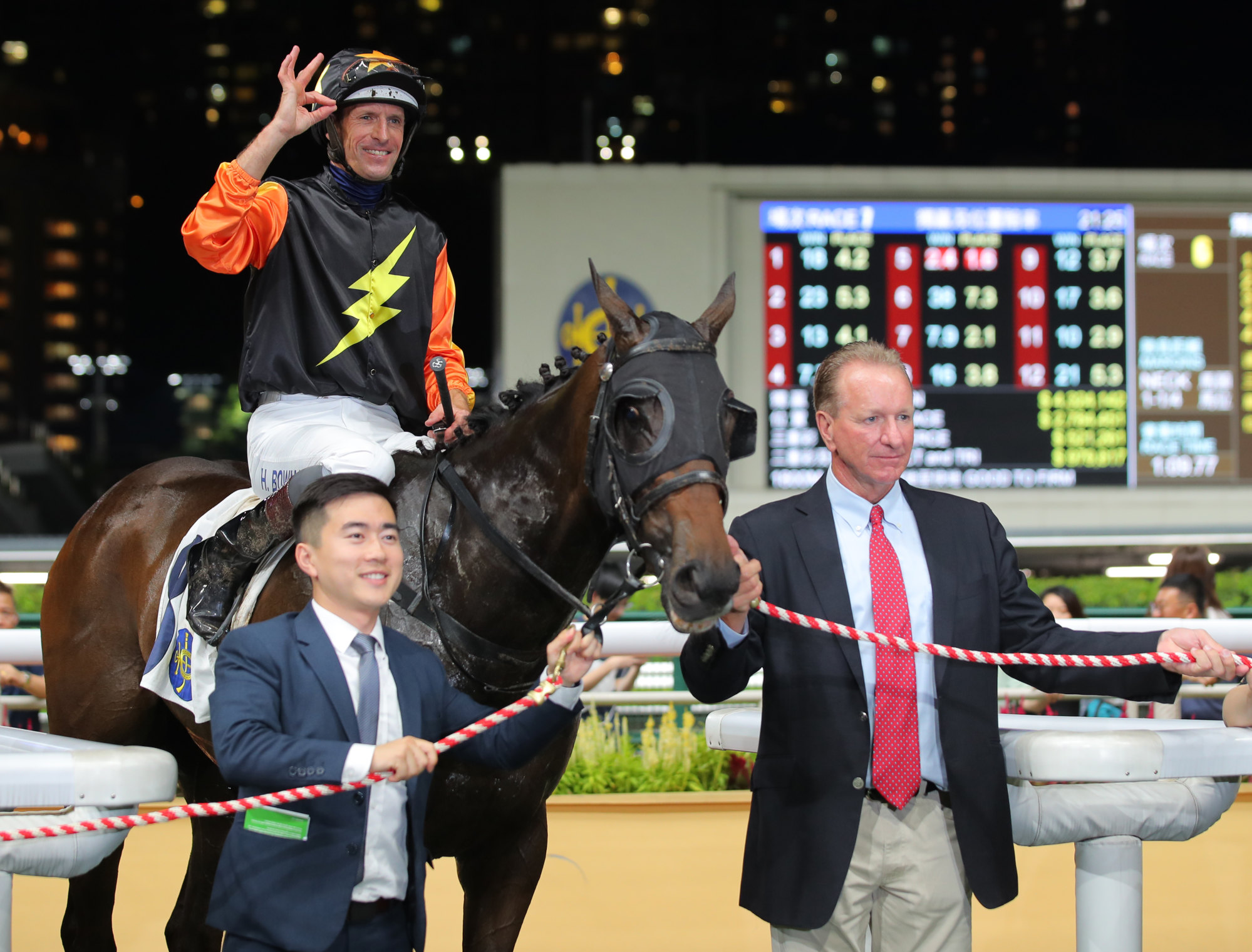 Tony Millard celebrates a win at Happy Valley this month with TOGEPI, ridden by Hugh Bowman. Photo: Kenneth Chan