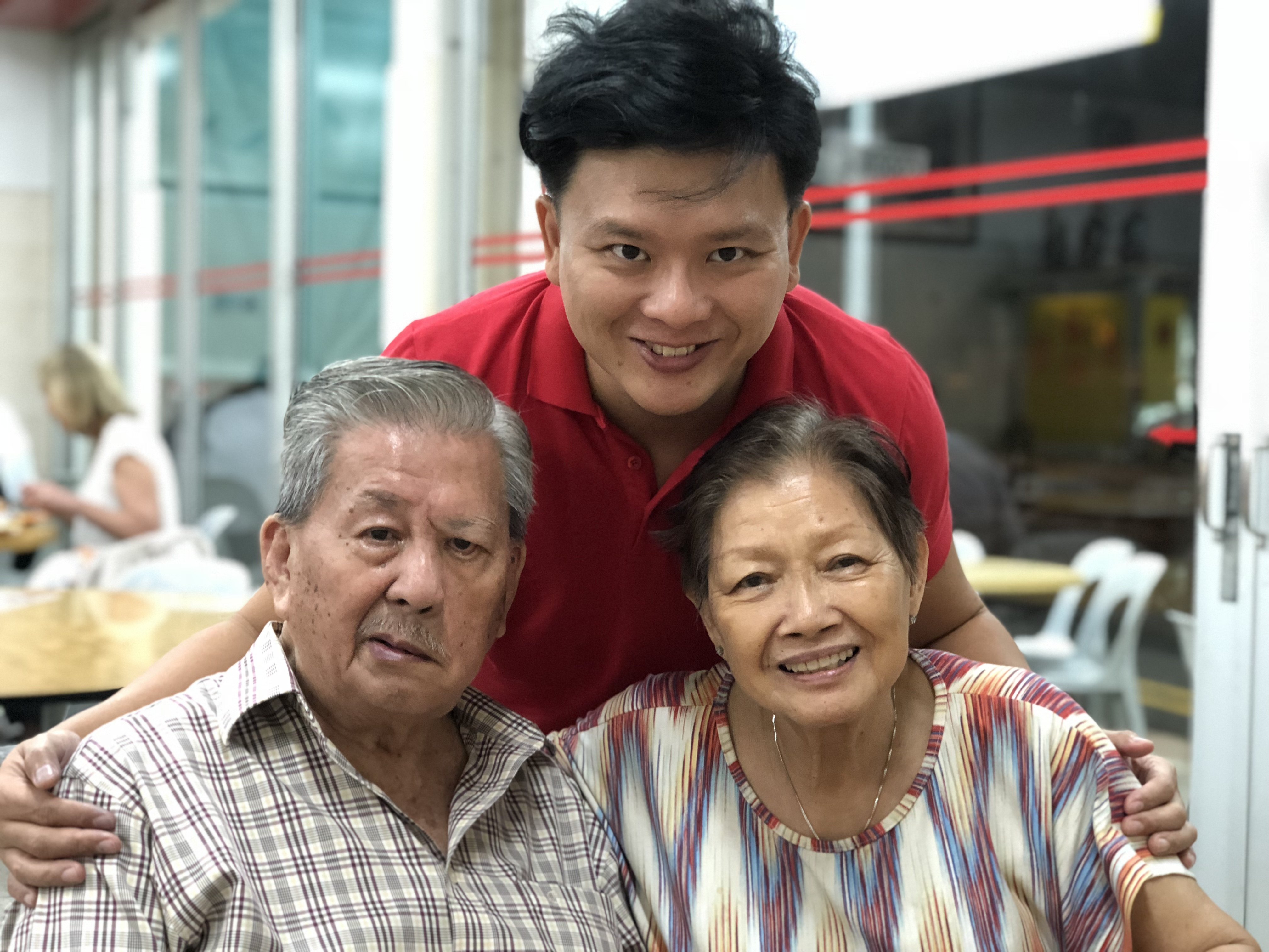An only child, Singaporean Daniel Lim (centre) had to step into a carer role at 30 when his parents’ health deteriorated. He shares how he came back from carer burnout – physical, emotional and mental exhaustion from constantly taking care of someone else. Photo: courtesy of Daniel Lim