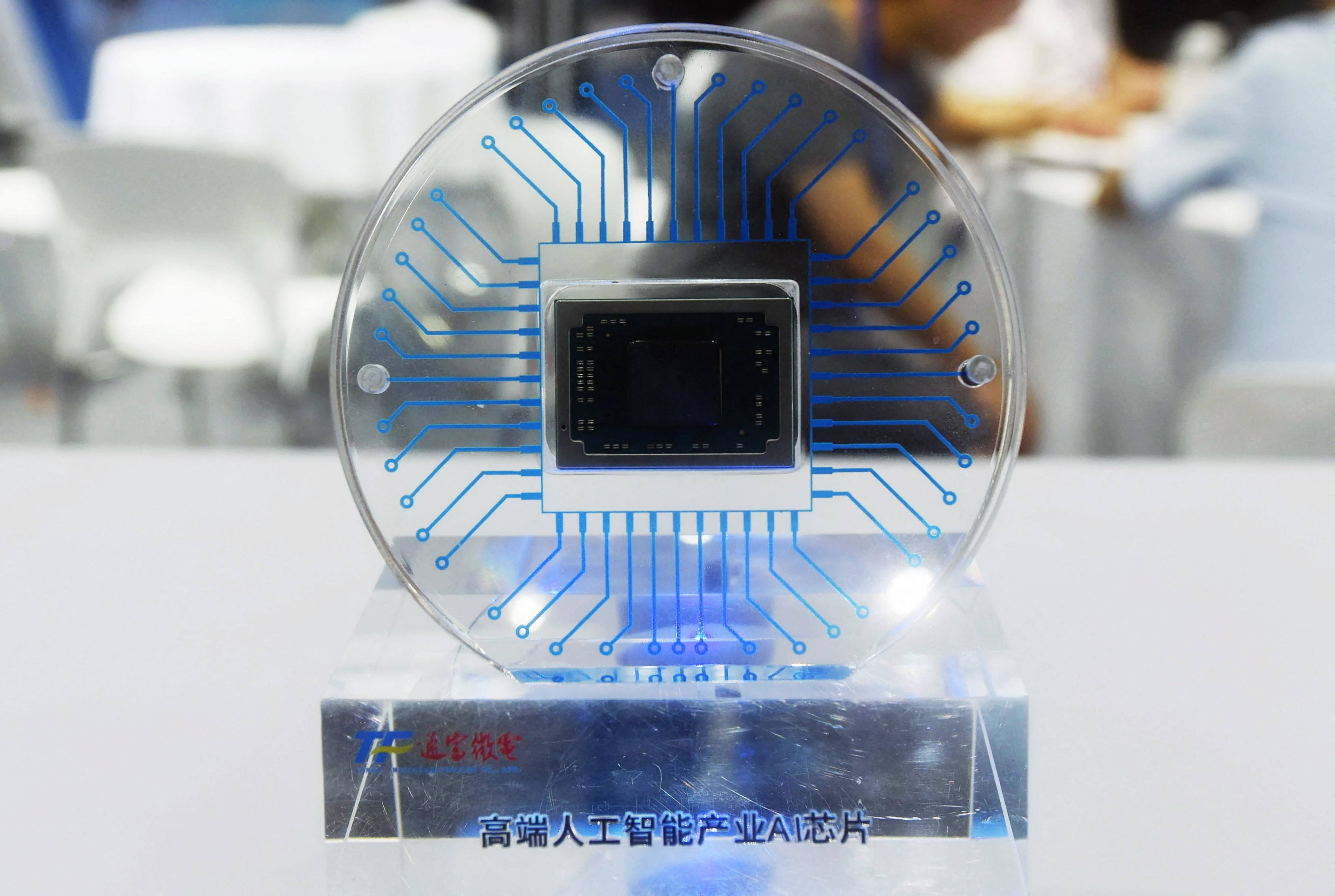 A chip from Tongfu Microelectronics is displayed during the World Semiconductor Congress in Nanjing,  Jiangsu province, July 19, 2023. Photo: AFP