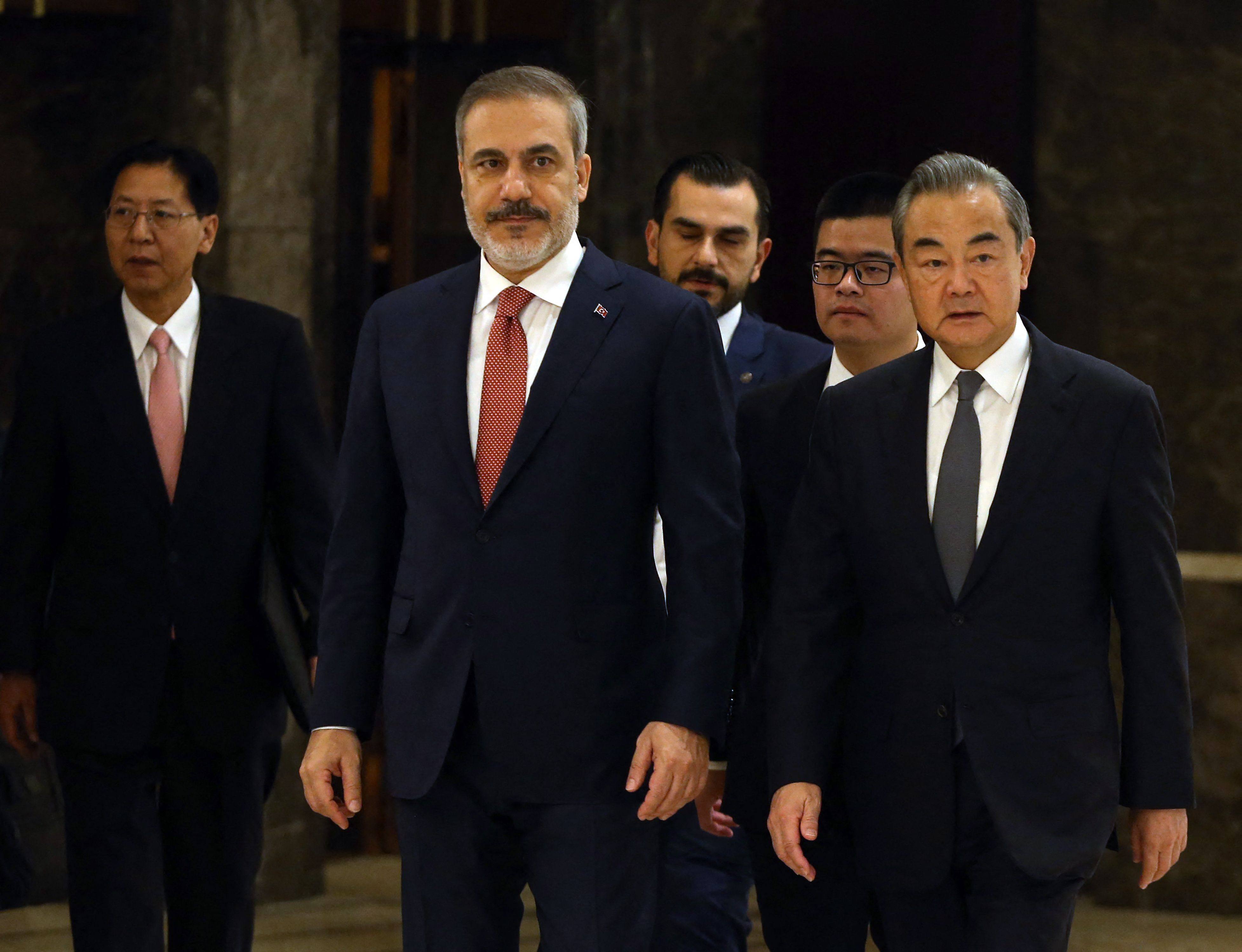 Turkish Foreign Minister Hakan Fidan (left) with China’s top diplomat, Wang Yi, in Ankara on Wednesday. Photo: AFP