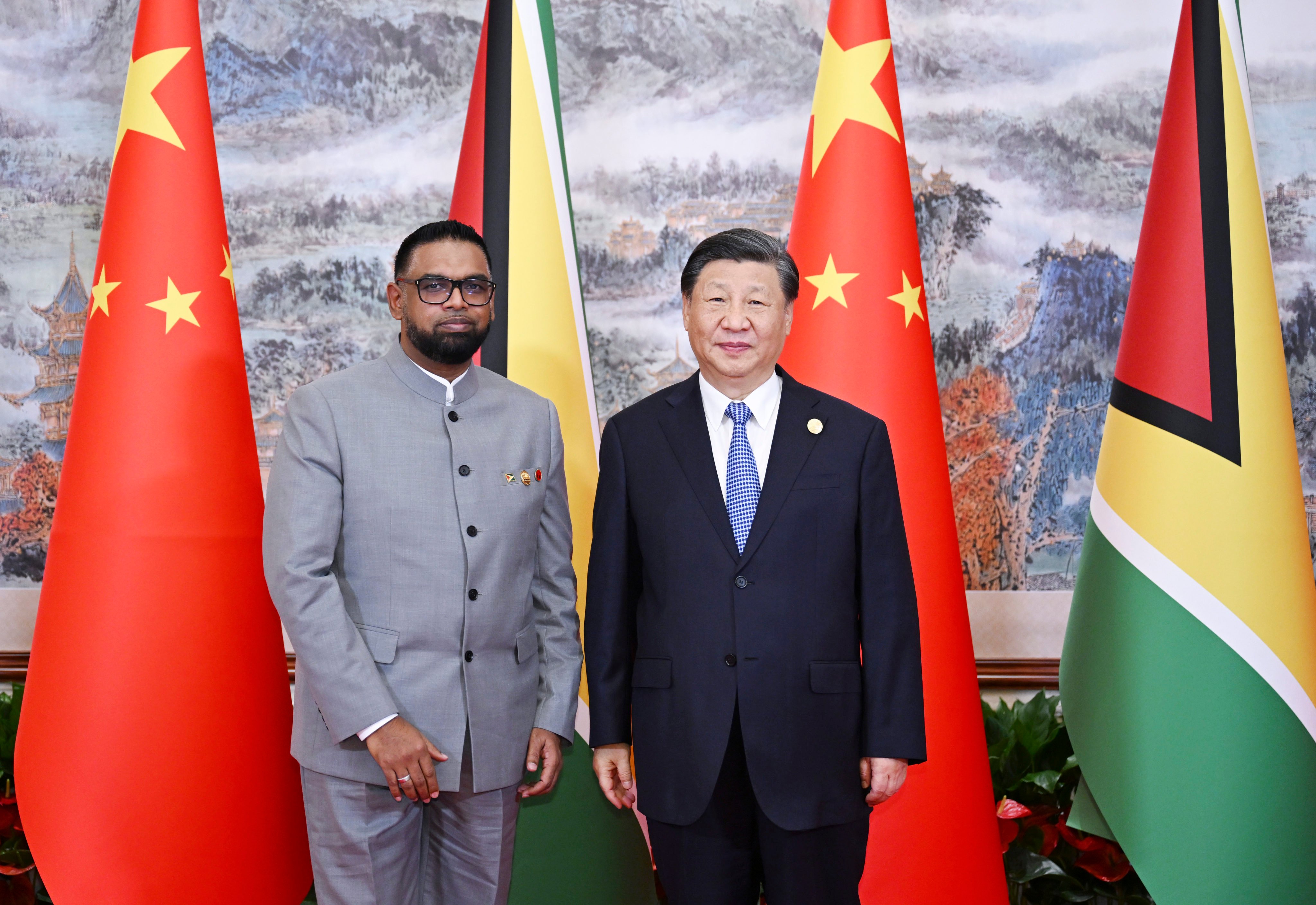 Chinese President Xi Jinping (right) meets Guyanese President Irfaan Ali in Chengdu on Friday. Photo: Xinhua