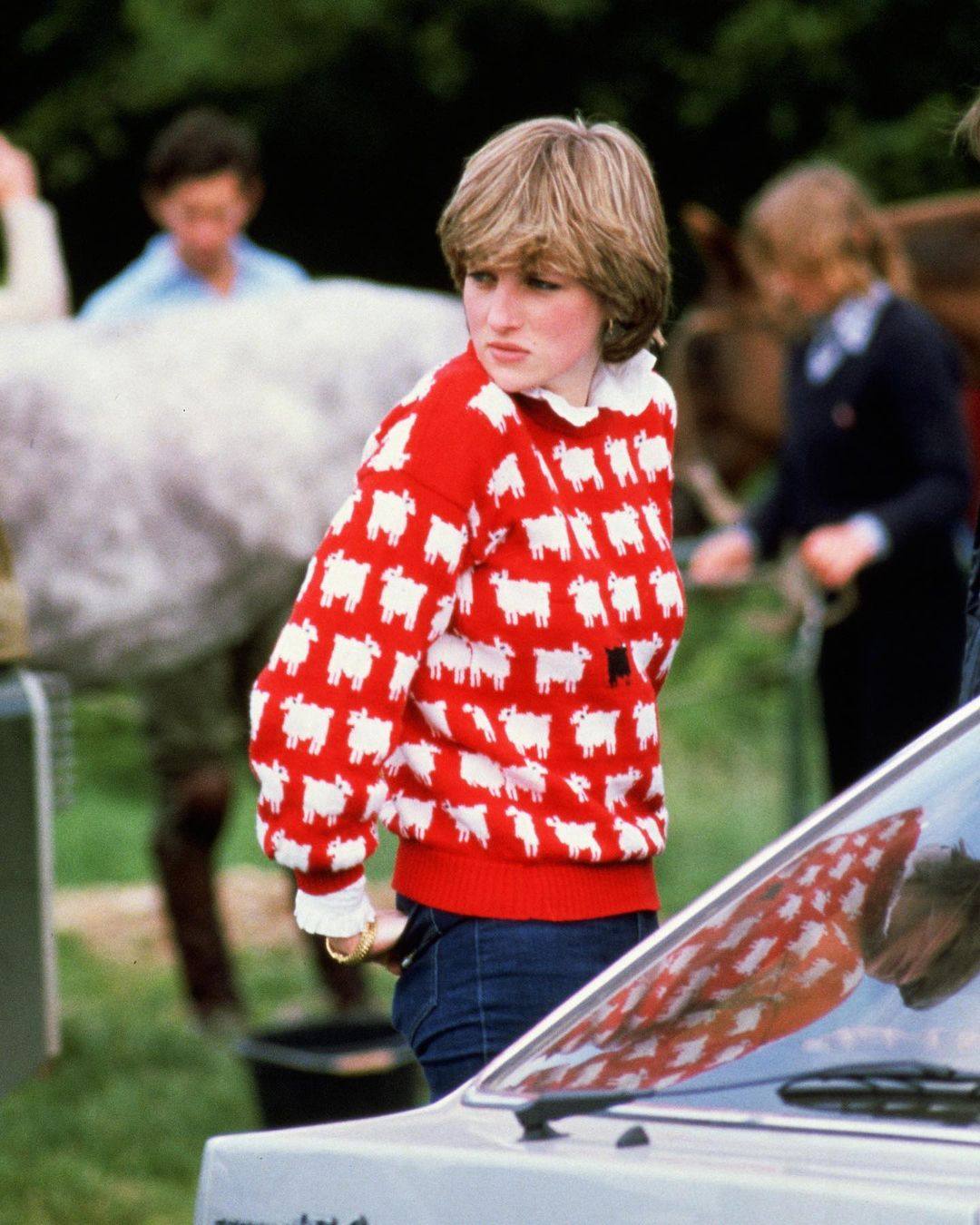 Princess Diana wearing her iconic black sheep jumper. Photo: @sothebys/Instagram