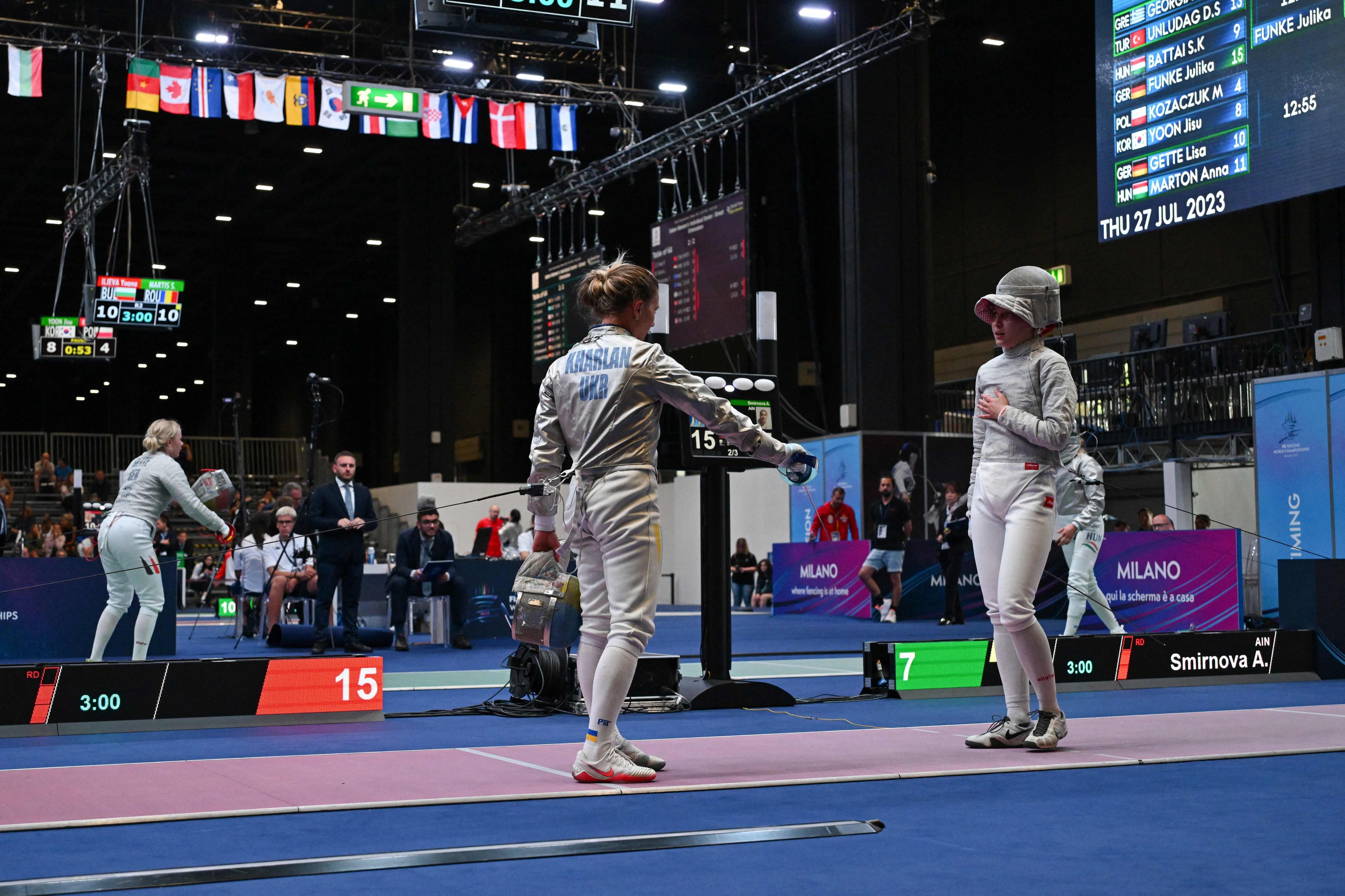 Ukraine’s Olga Kharlan (left) gestures as she refuses to shake hands with Russia’s Anna Smirnova at the FIE Fencing World Championships in Milan. Photo: AFP