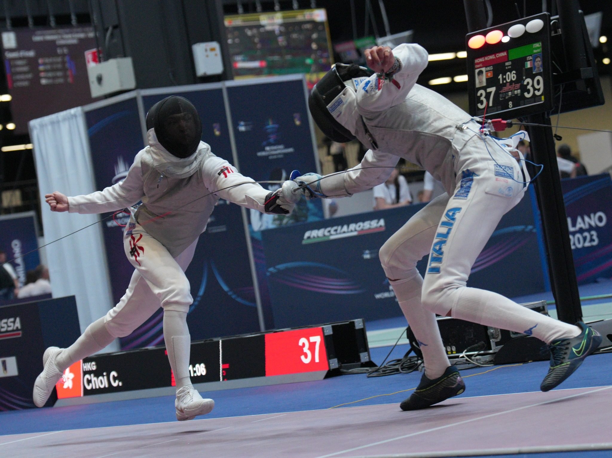 Ryan Choi (left) produced a brilliant display against Italy in the men’s team foil semi-finals at the World Championships in Milan. Photo: FIE