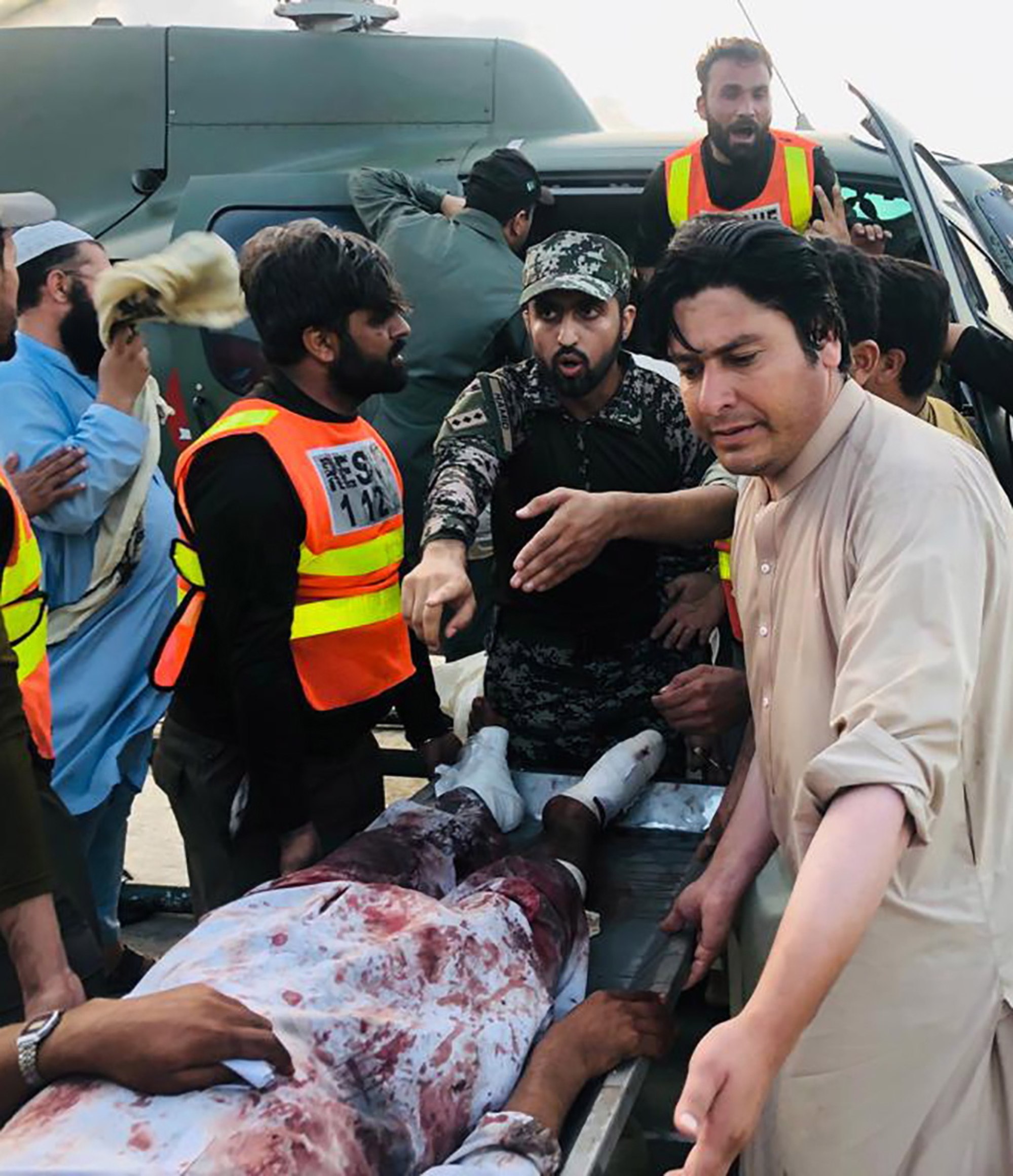 An injured person is taken to hospital following an explosion in Bajaur, Pakistan on Sunday. Photo: Rescue 1122 Handout / EPA-EFE
