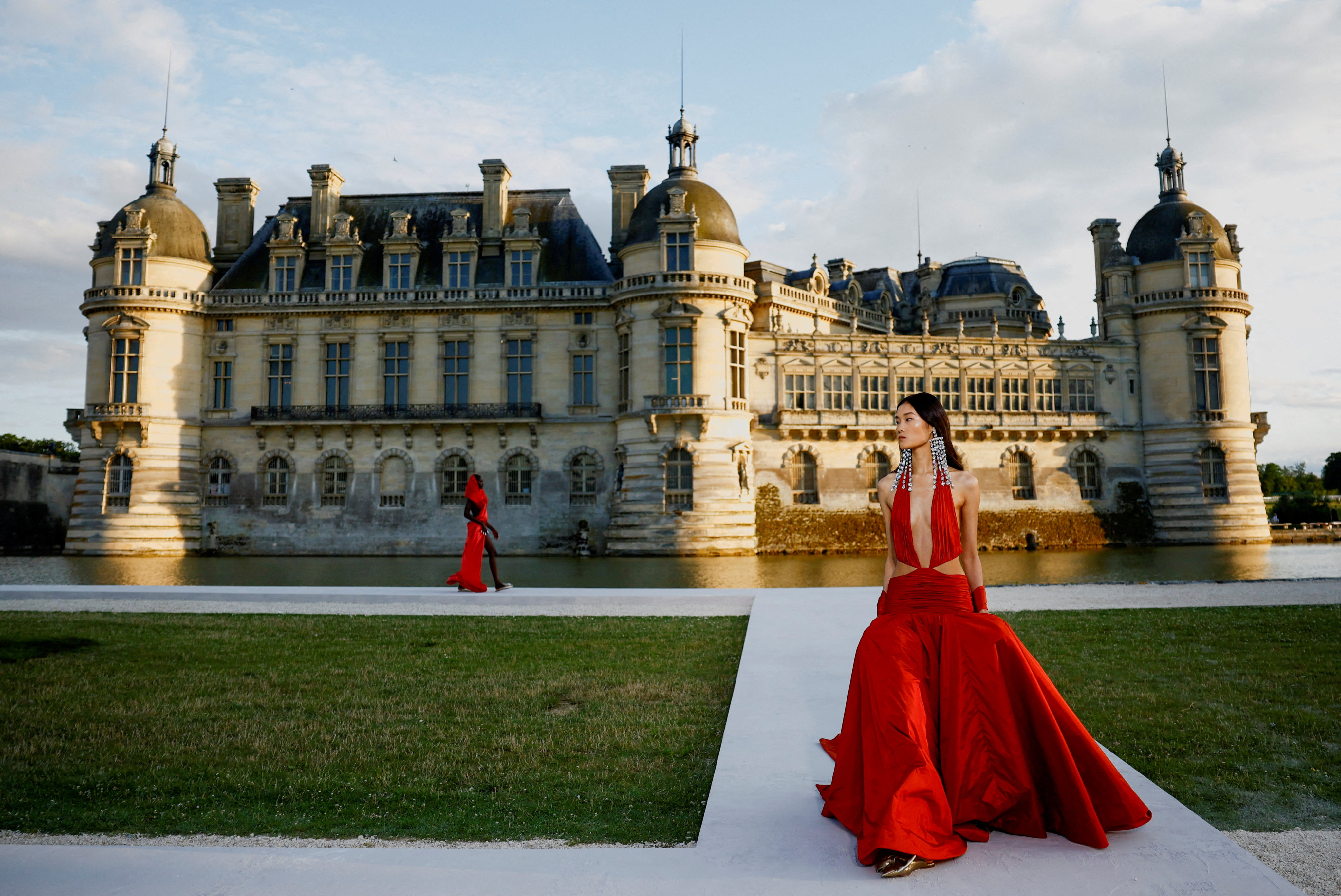 Models present creations by designer Pier Paolo Piccioli as part of his haute couture autumn/winter 2023-24 collection show for fashion house Valentino at the Château de Chantilly near Paris, France, on July 5. Photo: Reuters