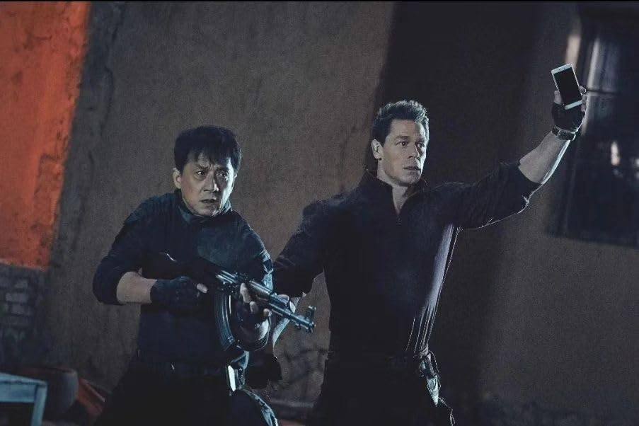 Jackie Chan (left) and John Cena in a still from “Hidden Strike”, a new Netflix movie directed by Scott Waugh.
