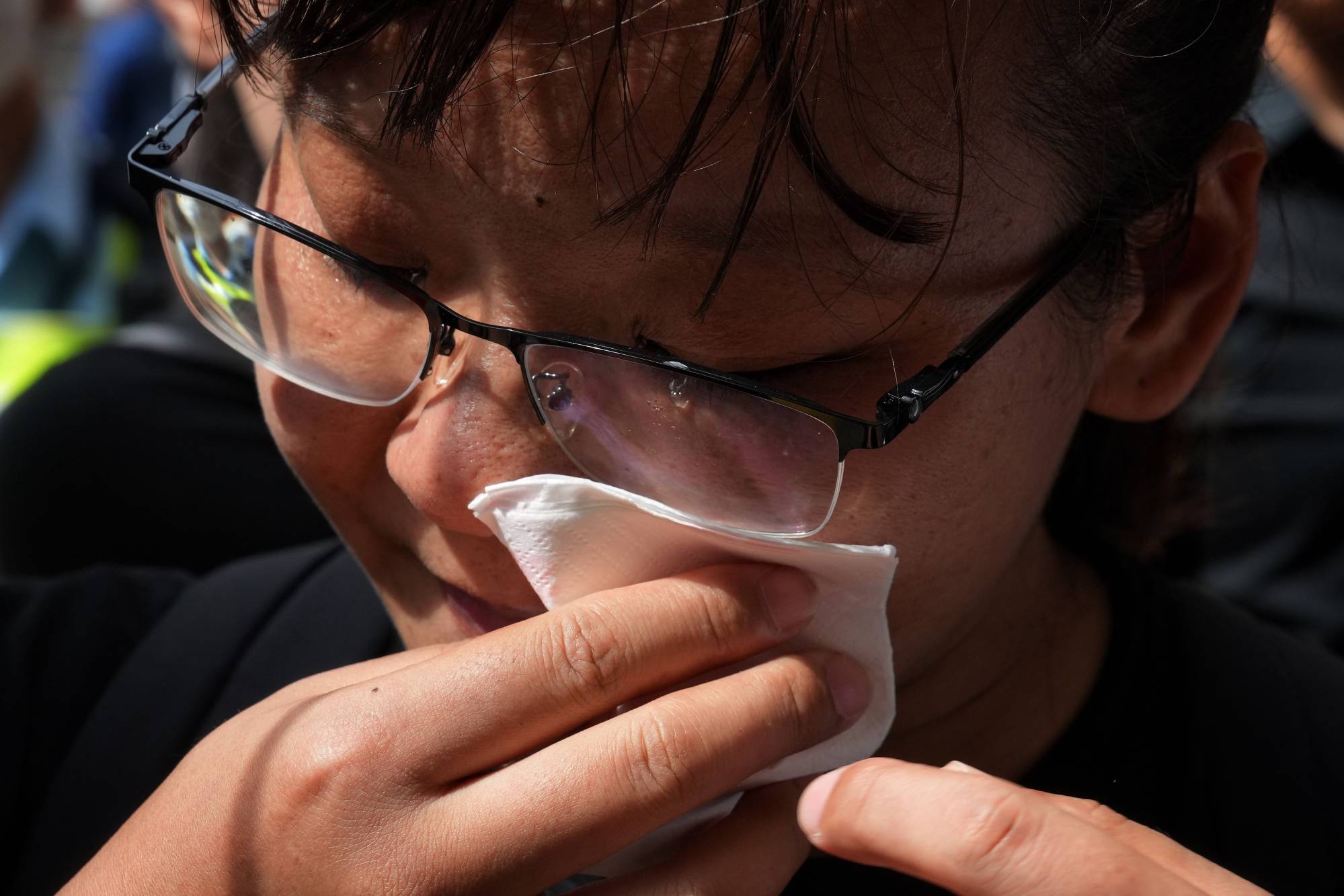 A fan weeps on the second day of the funeral of Coco Lee. Some of them have come all the way from the mainland. Photo: Elson Li