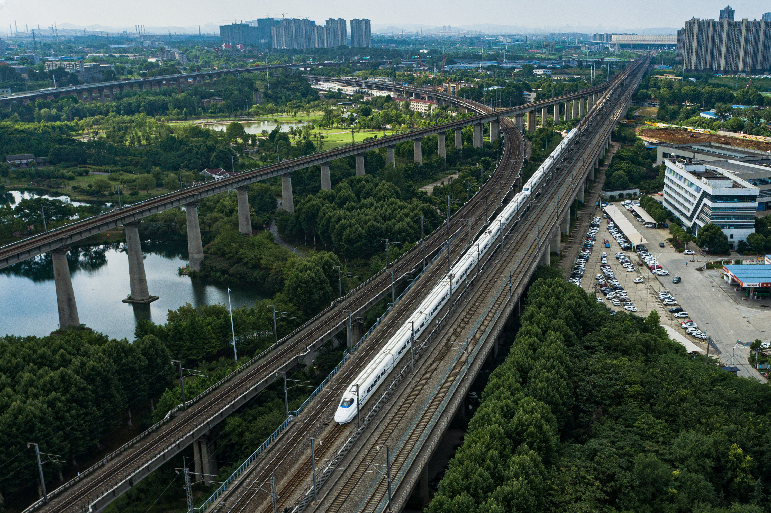 A high-speed train travels near Wuhan, in central China’s Hubei province. China’s railway experts have deployed AI-powered robots to assemble some of the most labour-intensive components of high-speed railway projects. Photo: Xinhua