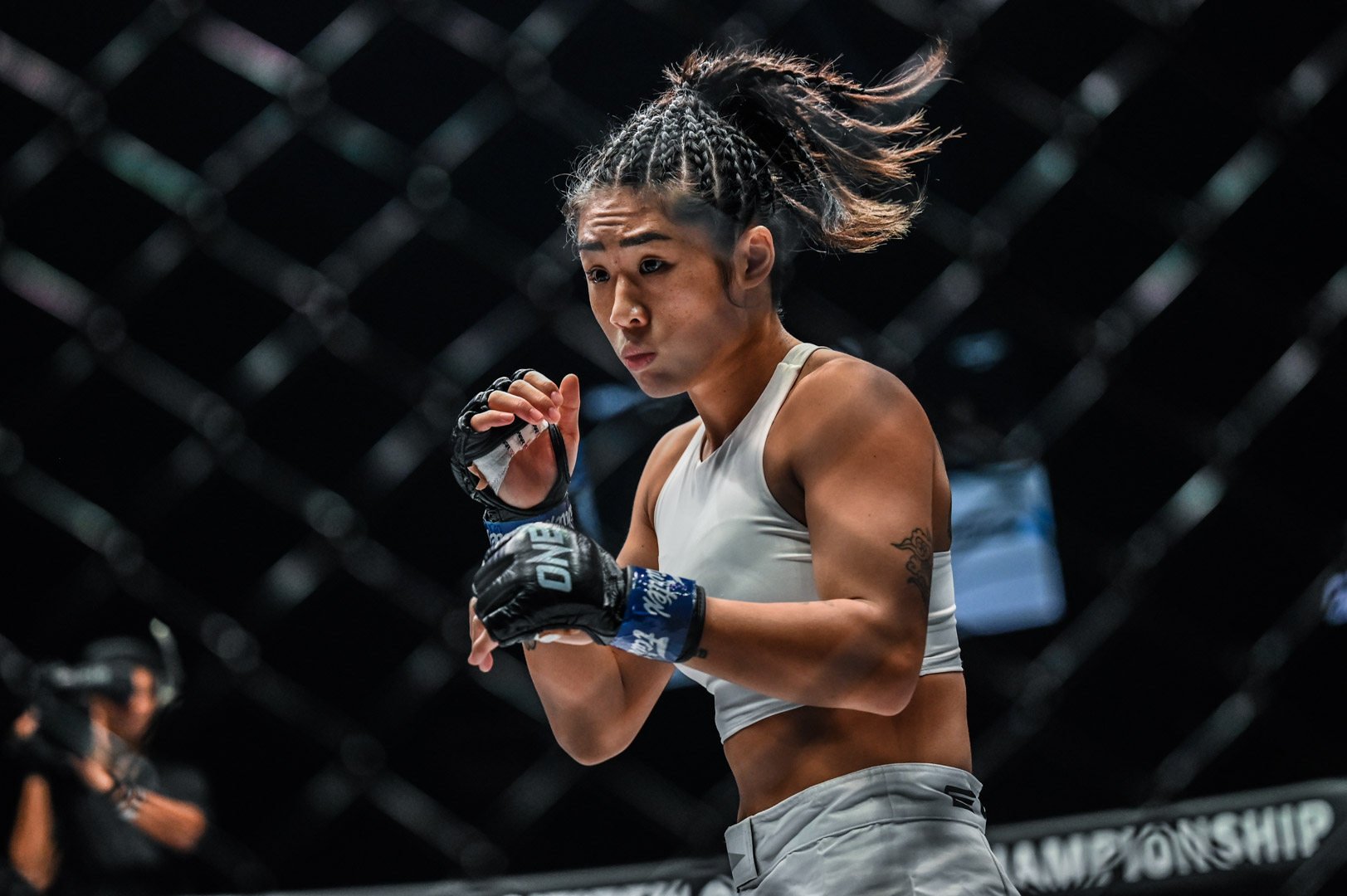 Angela Lee during her strawweight title fight with Xiong Jingnan in Singapore. Photos: ONE Championship