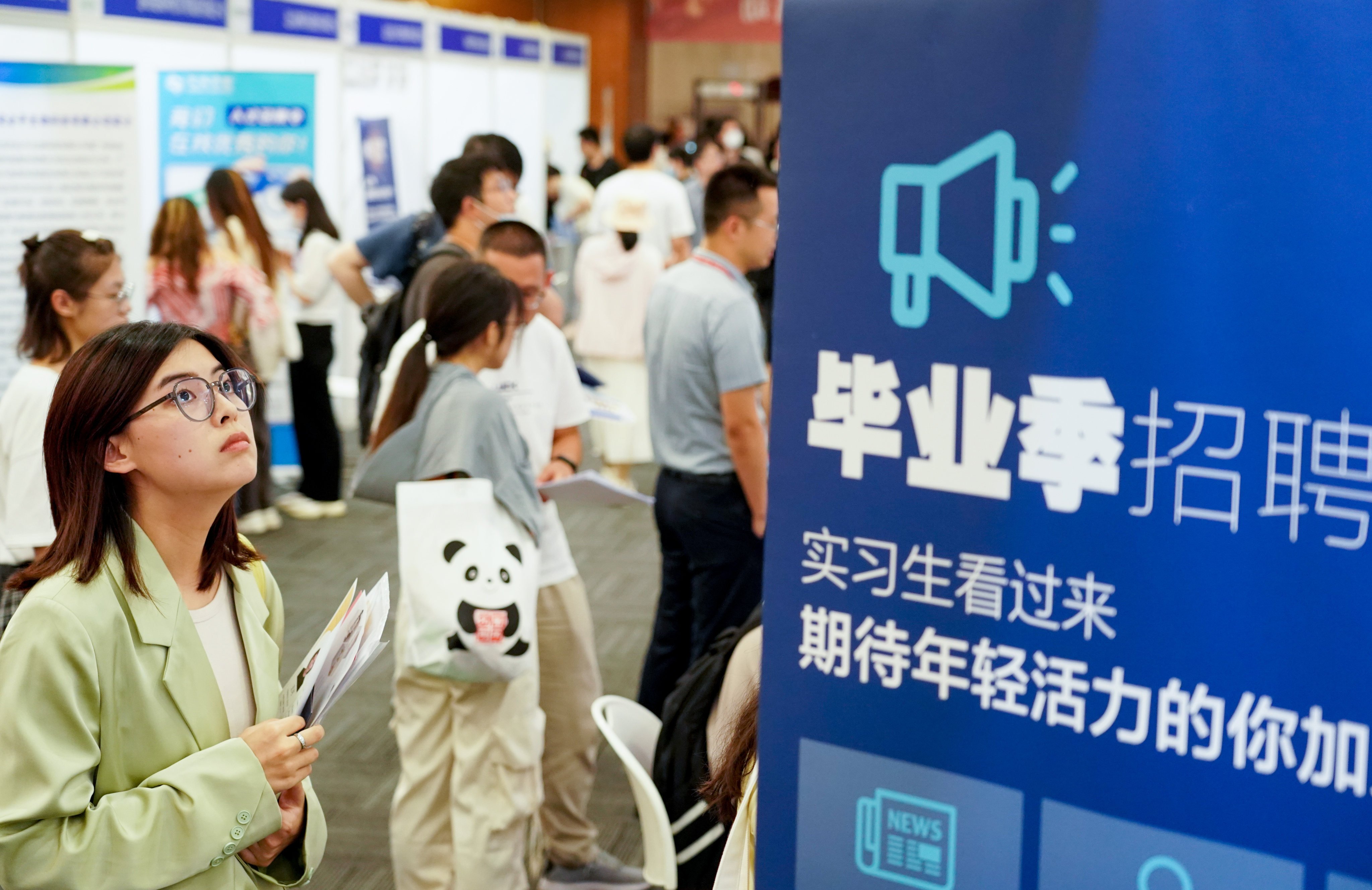 A Beijing job fair for university graduates on July 24. Disruptive innovations like AI are drivers of sustained economic growth, but they also destroy existing economic actors like specific industries, companies and jobs. Photo: Xinhua