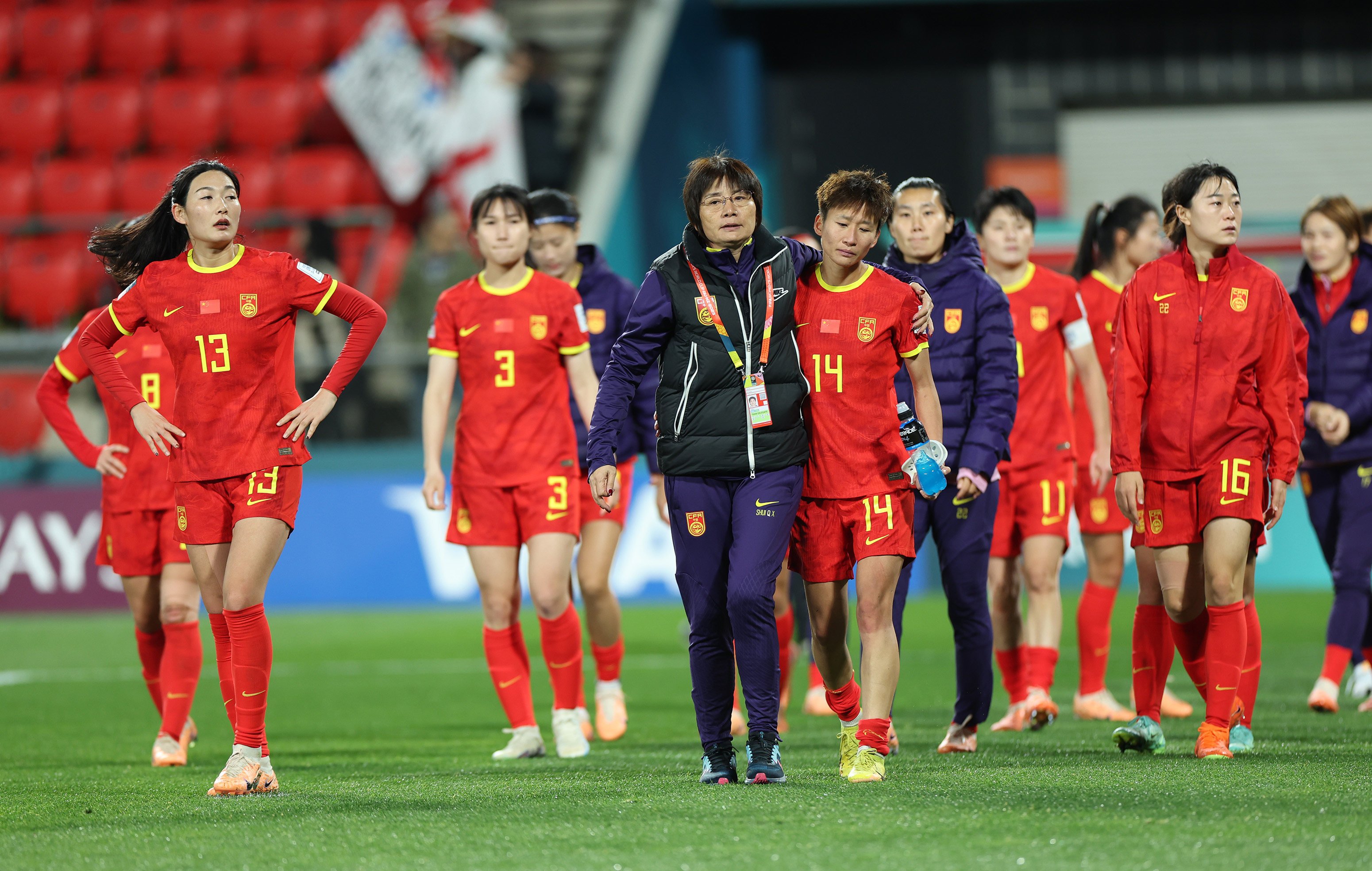 China leave the pitch after a 6-1 loss to England which knocked them out of the Women’s World Cup. Photo: Xinhua