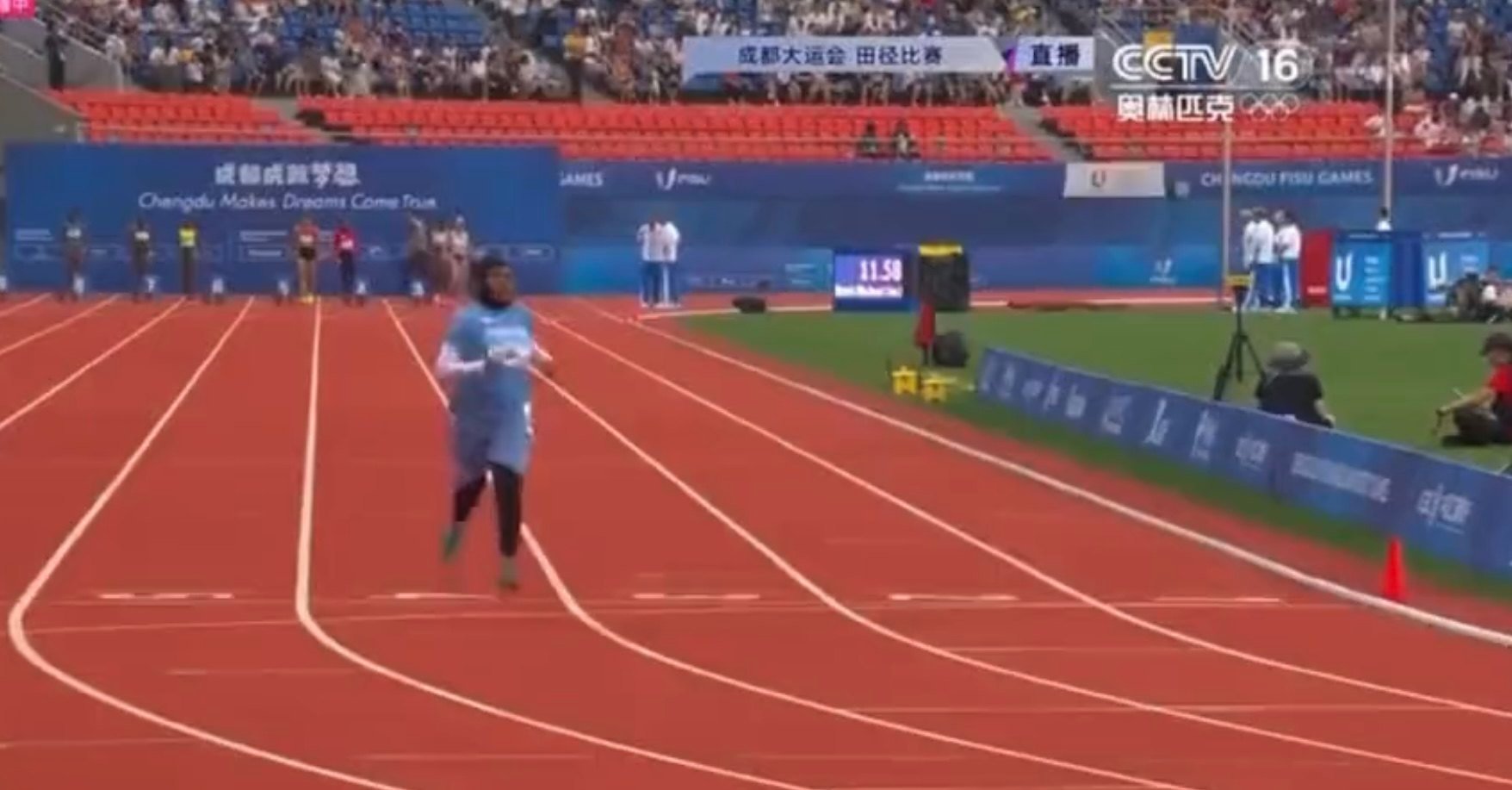Nasro Abukar Ali finishes the women’s 100m race at the World University Games in Chengdu. Photo: CCTV