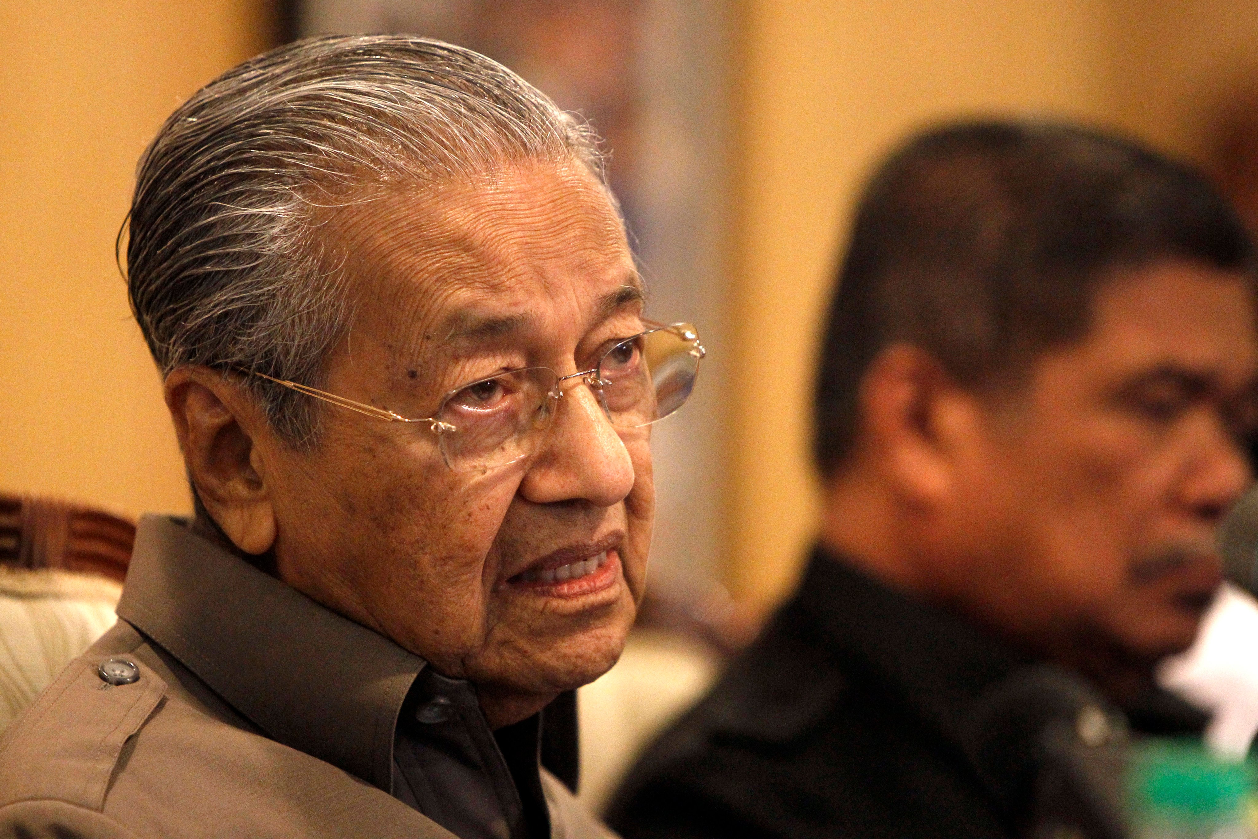 Mahatir Mohamad, now 98, speaks at a press conference in 2018, while he was prime minister. Photo: AP