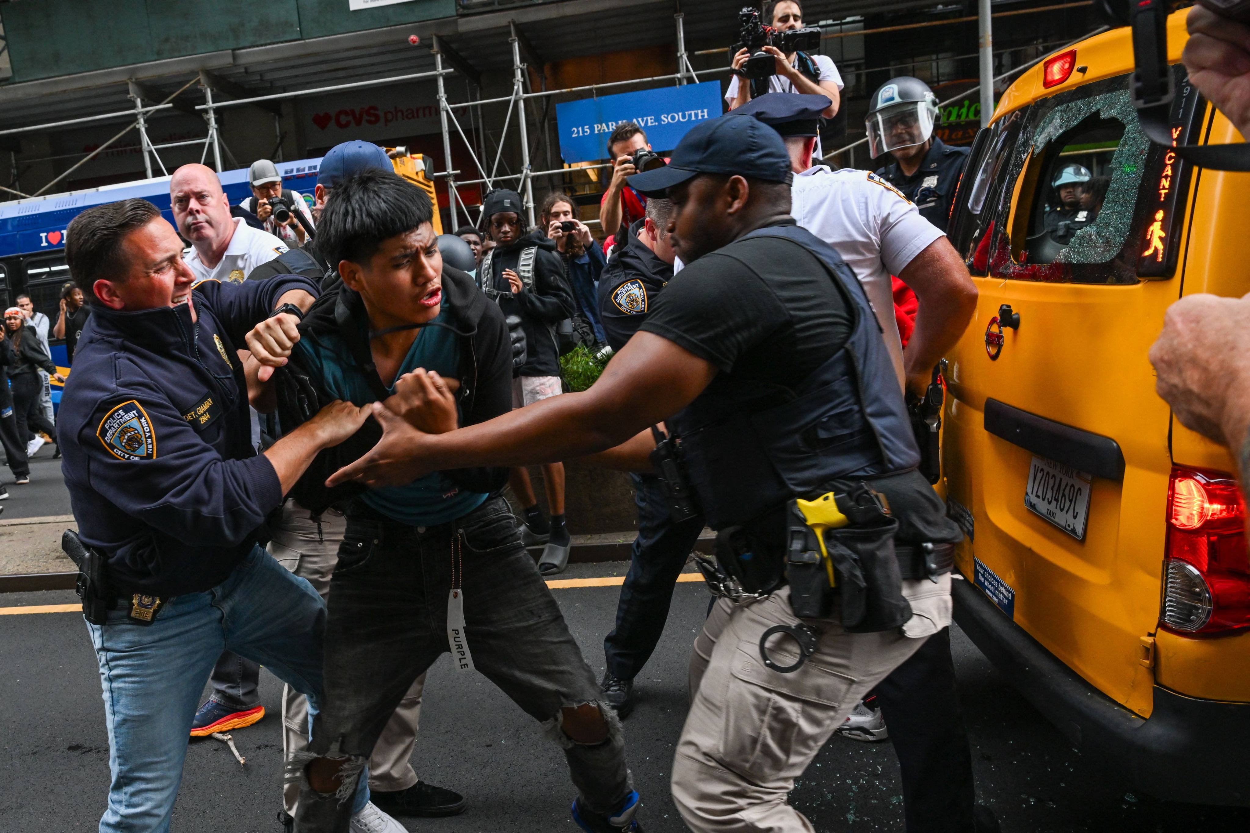 Police respond to the disruptions caused by large crowds during a “giveaway” event hosted by popular live streamer Kai Cenat in Union Square and the surrounding area in New York on Friday. Photo: AFP