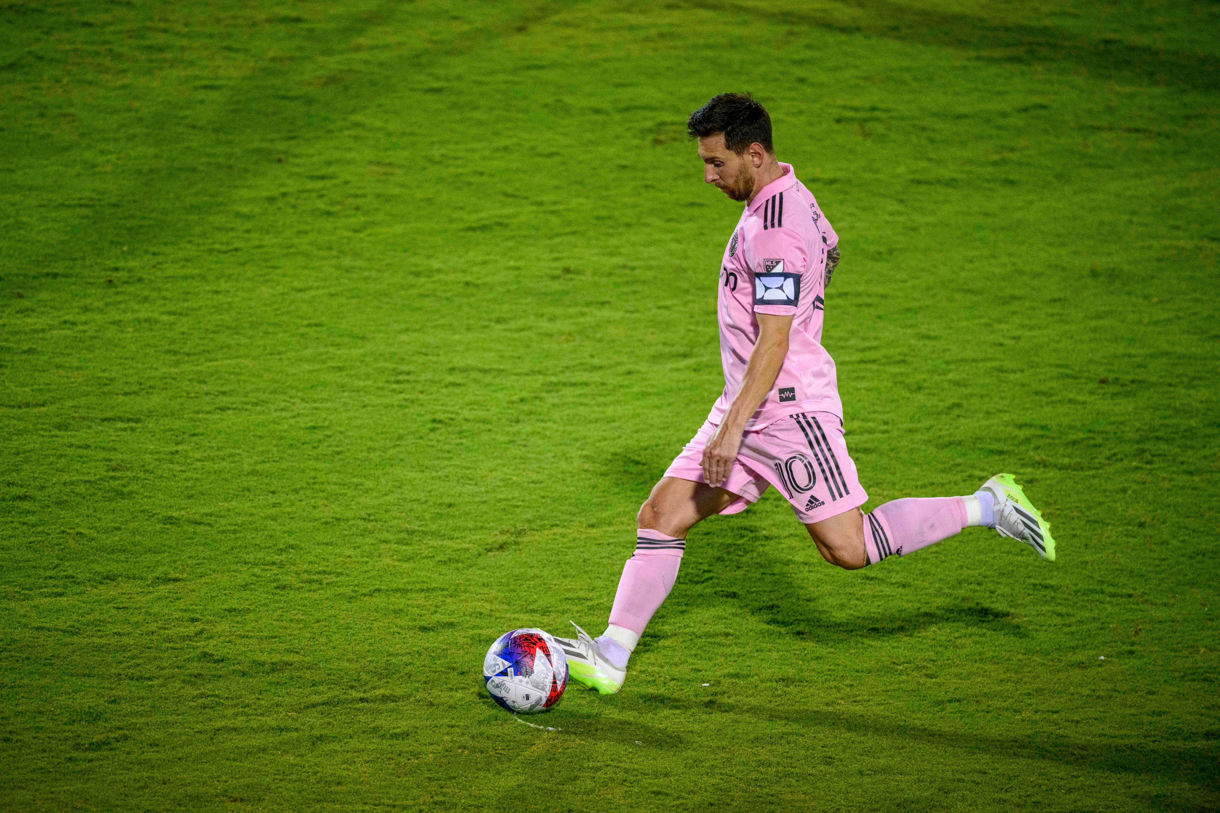 Inter Miami forward Lionel Messi attempts a free kick in a round of 16 match against FC Dallas. Photo: Reuters