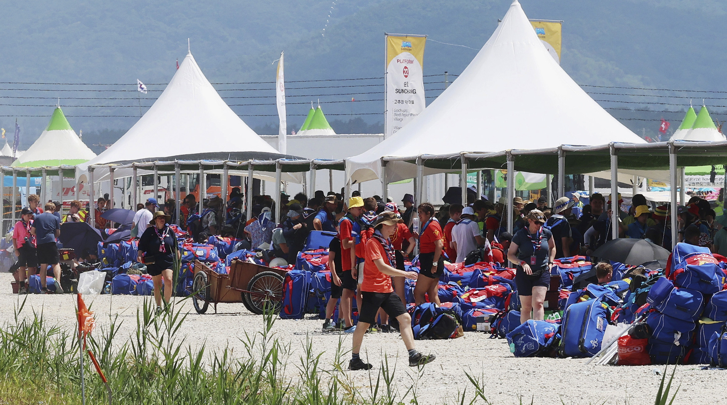 Delegates gather to leave the World Scout Jamboree campsite in Buan, South Korea. Photo: AP