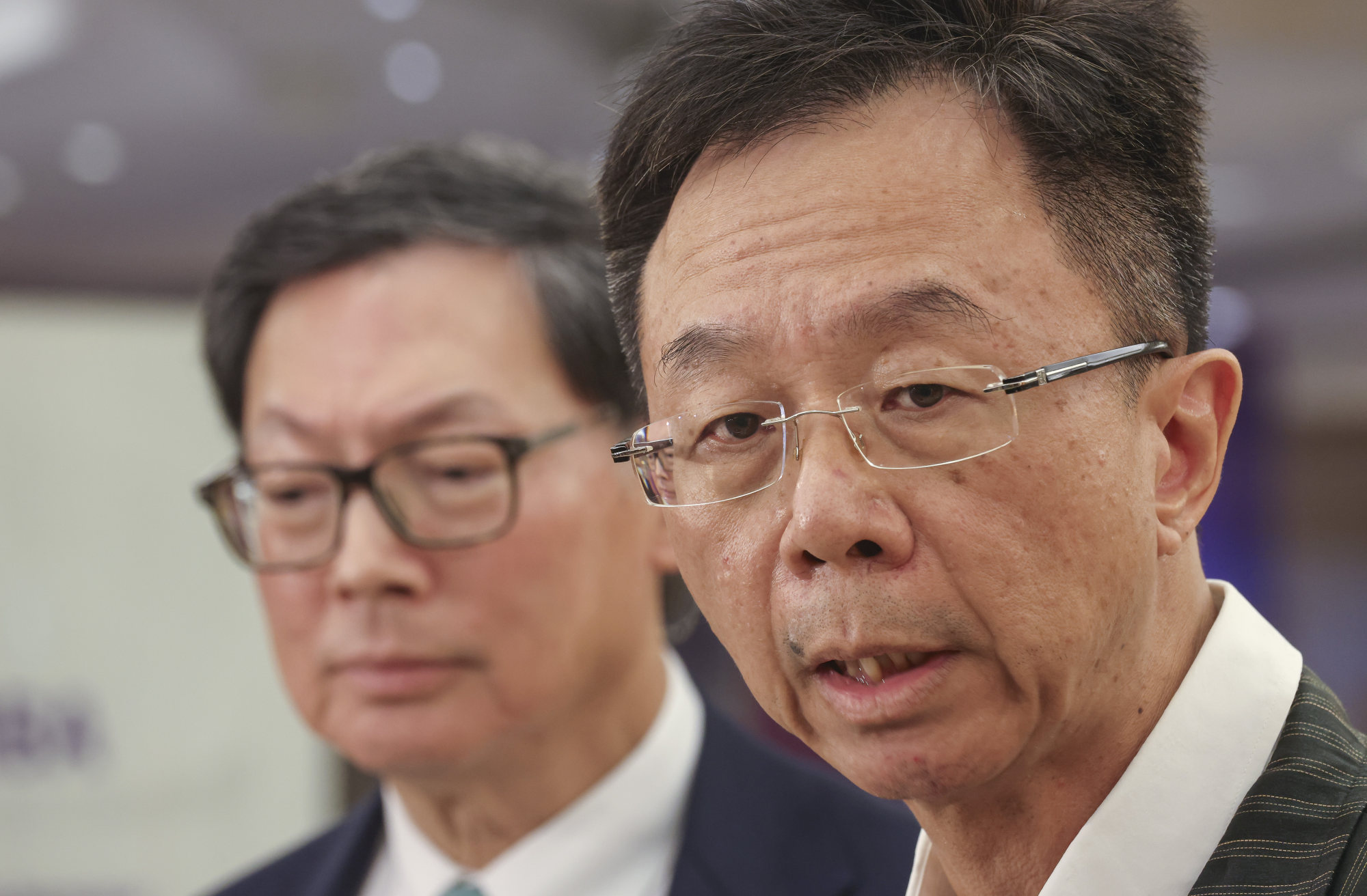 (From left) CUHK council leaders Norman Chan and John Chai. Photo: Jonathan Wong