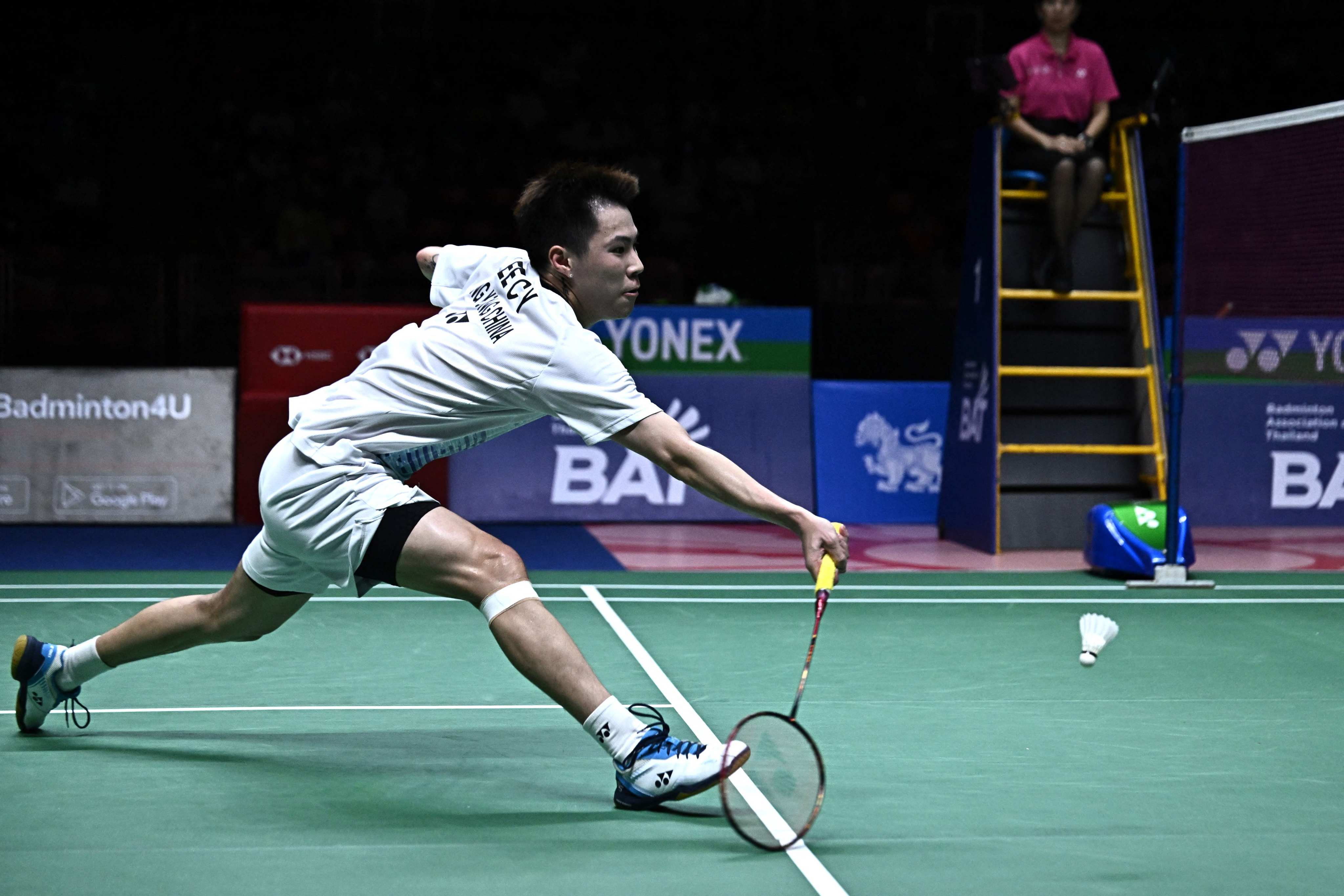 Hong Kong’s Lee Cheuk Yiu hits a return against Thailand’s Kunlavut Vitidsarn during their men’s singles final at the 2023 Thailand Open badminton tournament in Bangkok on June 4, 2023. Photo: AFP