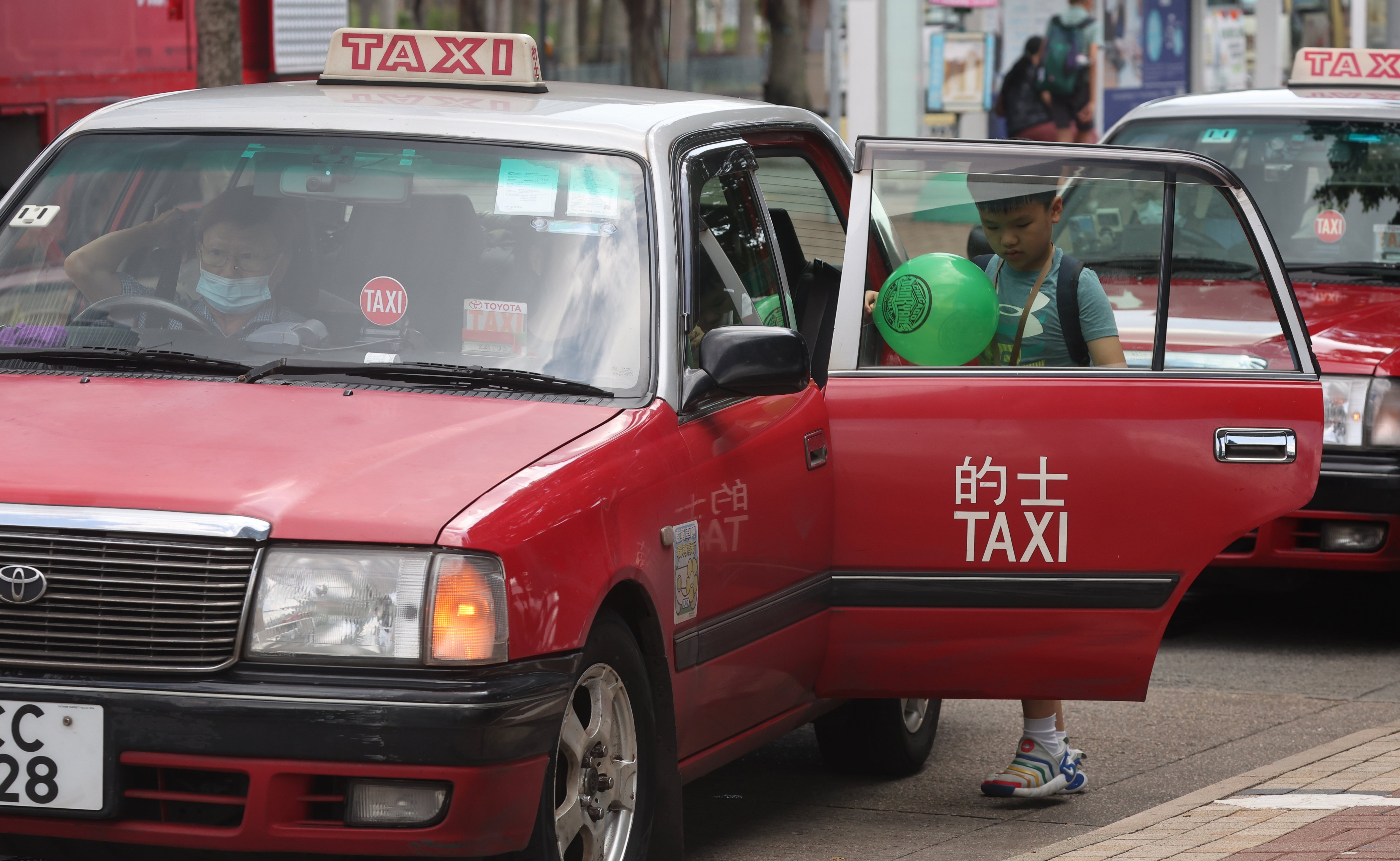 Authorities have proposed a demerit points scheme, which will slap cabbies with three, five or 10 penalty points if they violate any of 11 offences. Photo: Edmond So