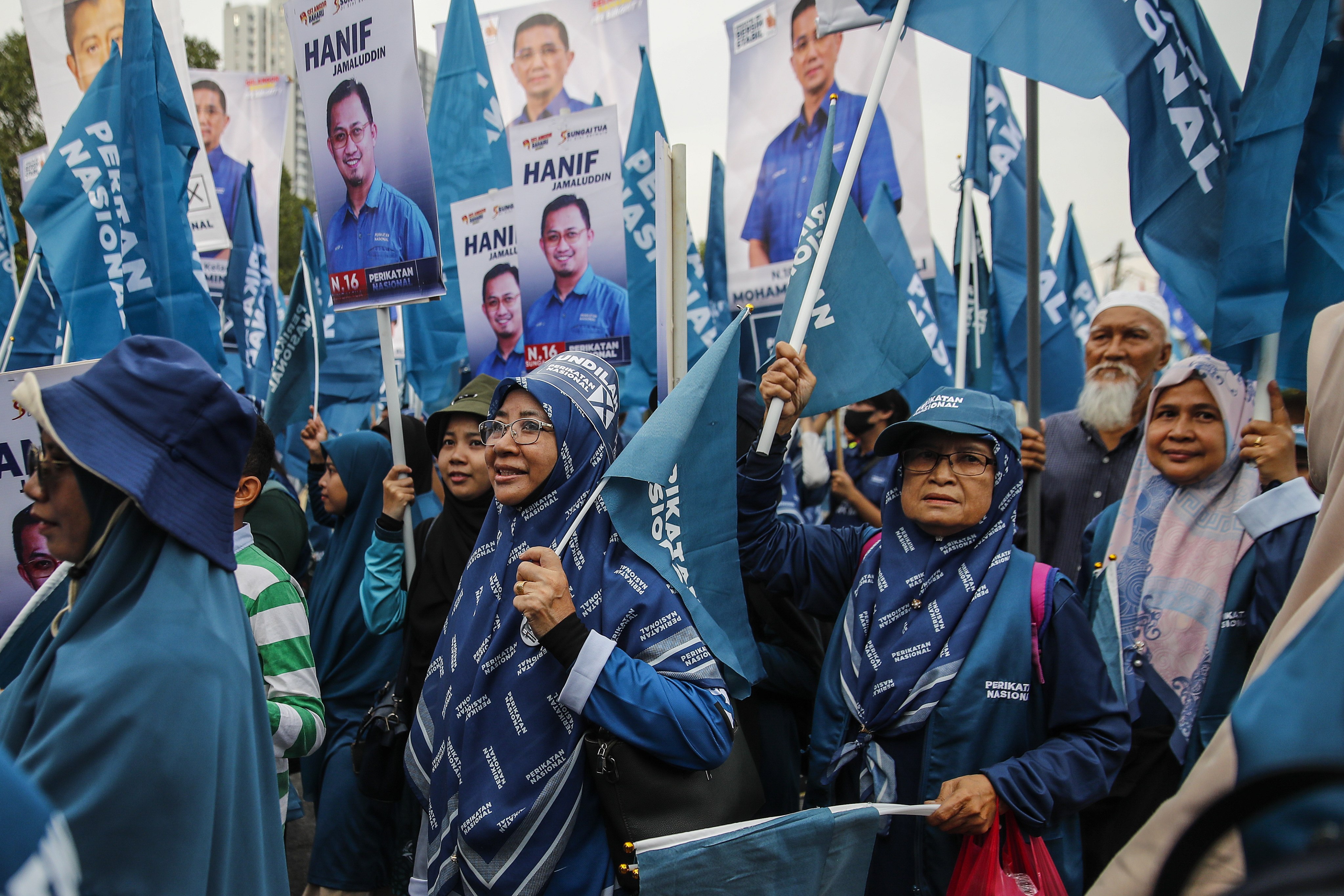 Supporters of Perikatan Nasional march in Gombak, outside Kuala Lumpur, Malaysia, in July. Photo: EPA-EFE