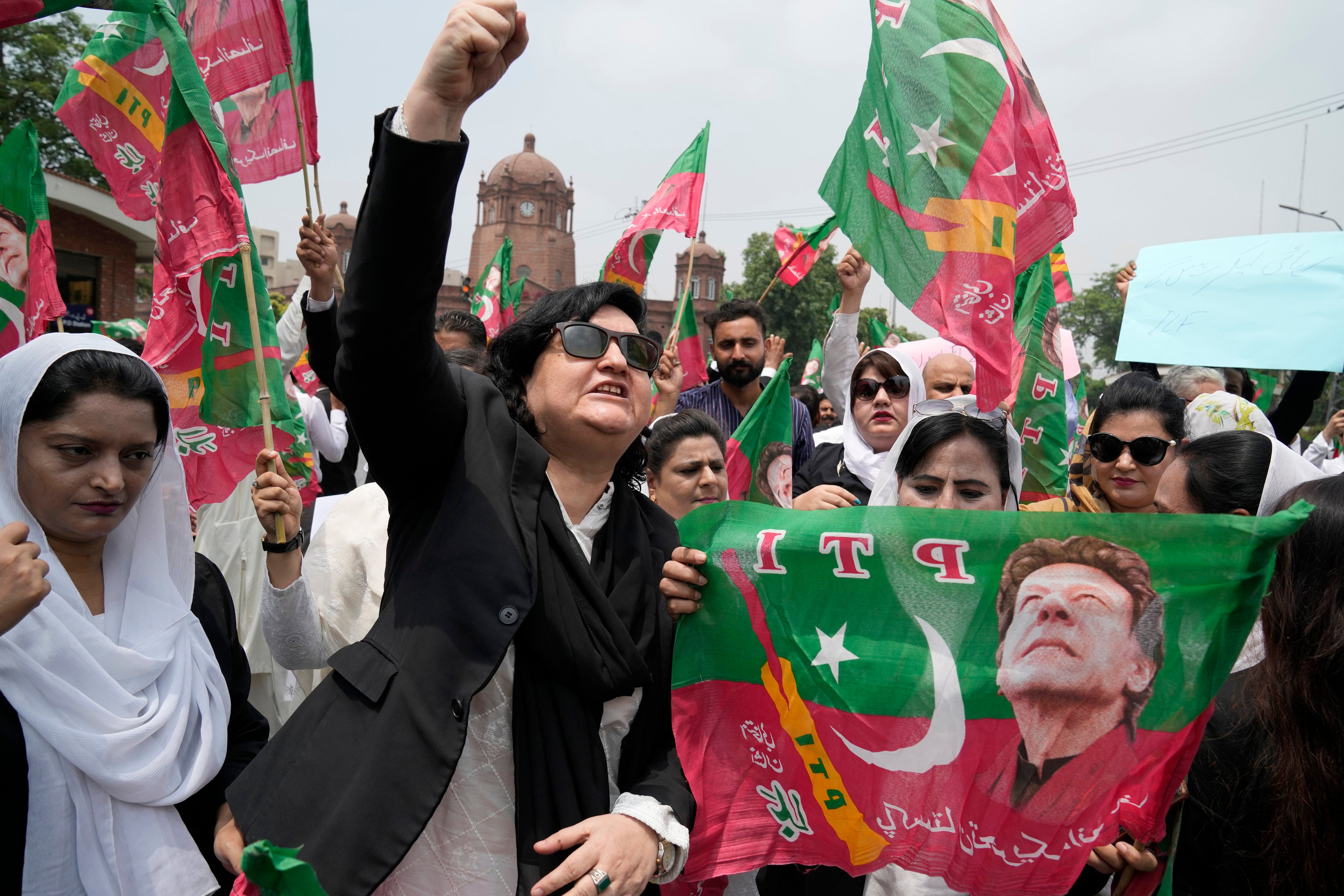 Supporters of former Pakistan prime minister Imran Khan hold a protest against Khan’s imprisonment in Lahore, Pakistan, on August 7. Khan has been jailed for three years after being convicted of corruption. Photo: AP