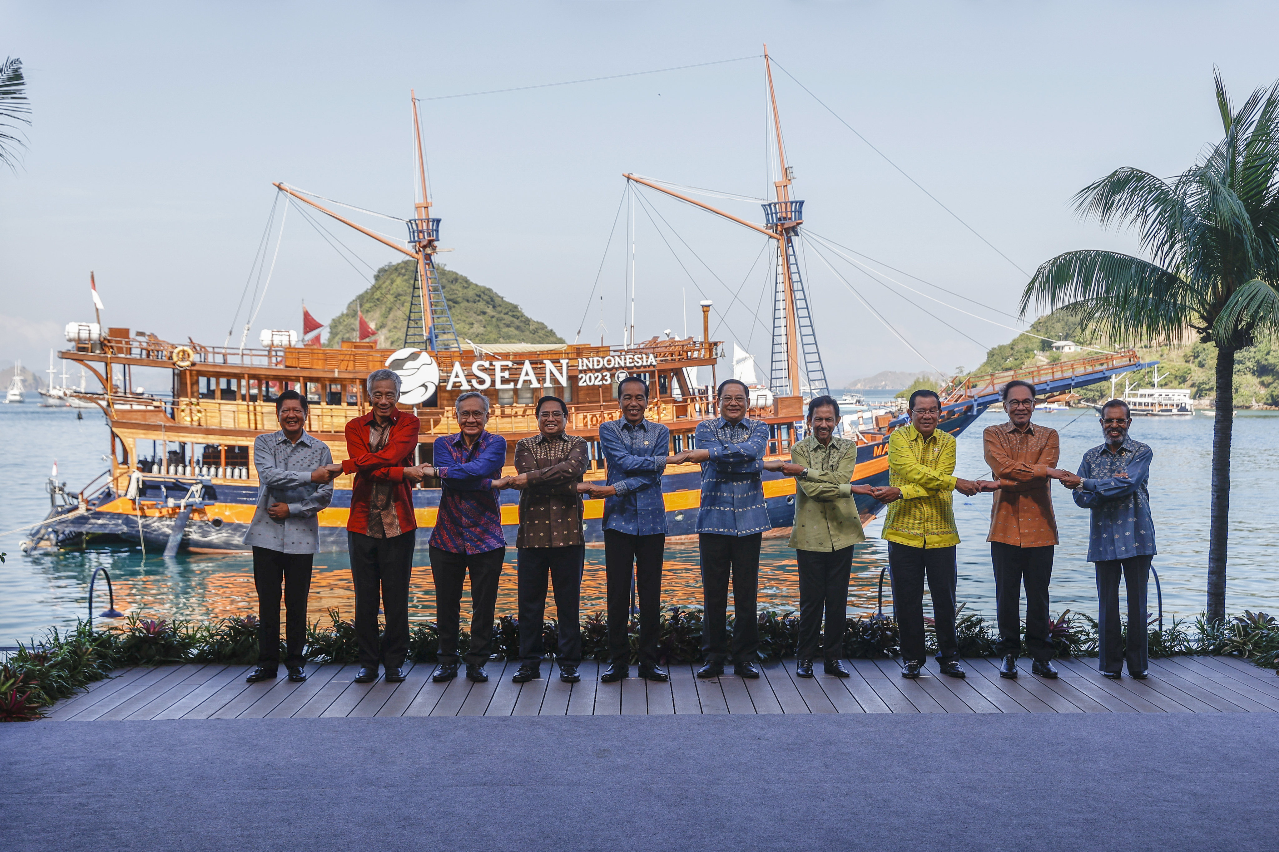 Asean leaders hold hands for a group photo during a summit in Labuan Bajo, Indonesia, on May 11. Photo: AP
