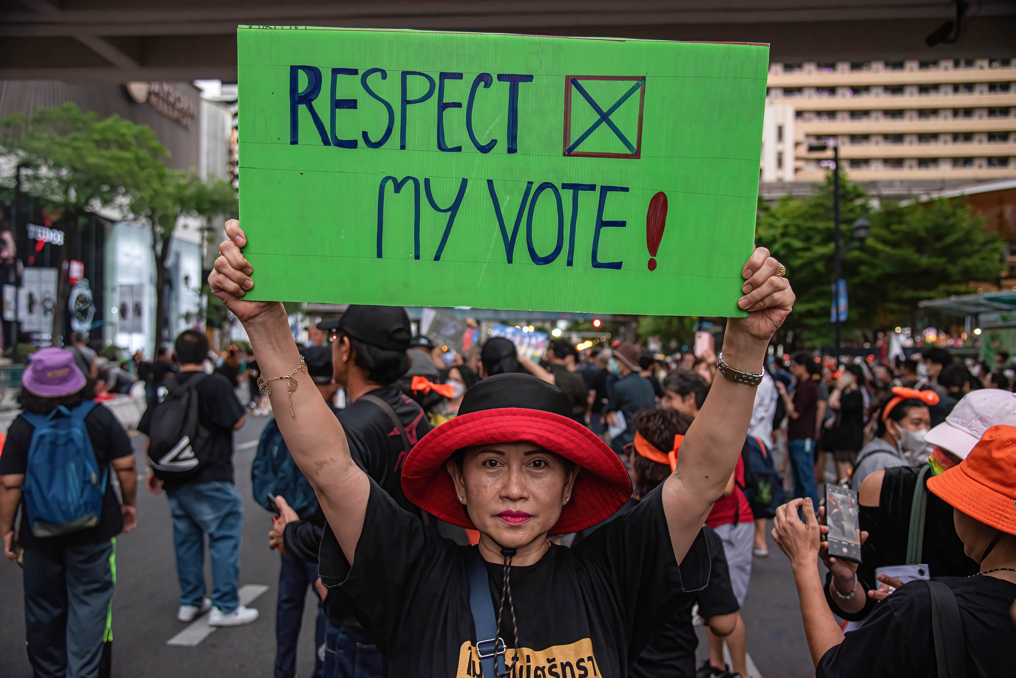 A protester holds up a placard during a pro-democracy demonstration calling the senators to respect the result of the May 14 general election in Bangkok and support Pita Limjaroenrat, the prime minister candidate from the Move Forward party who won the election. Photo: dpa
