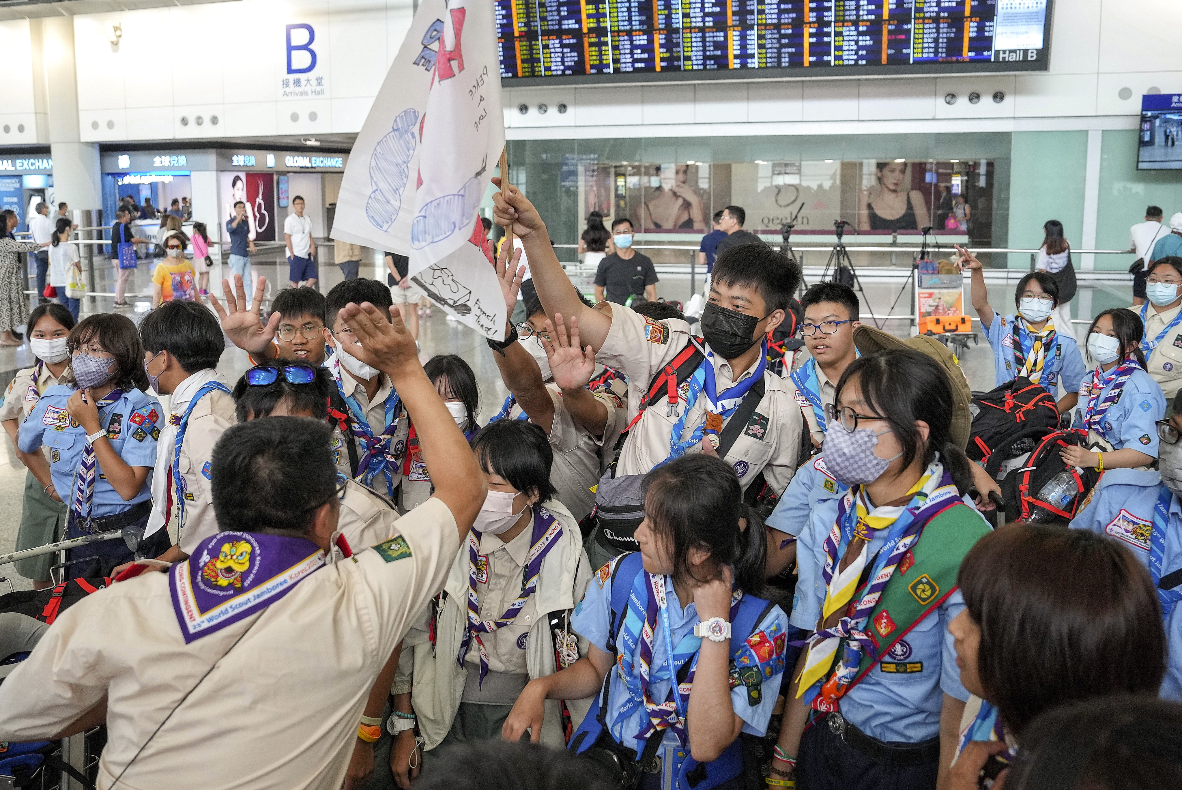 Hong Kong Scouts return to the city from South Korea after the World Scout Jamboree was cut short.