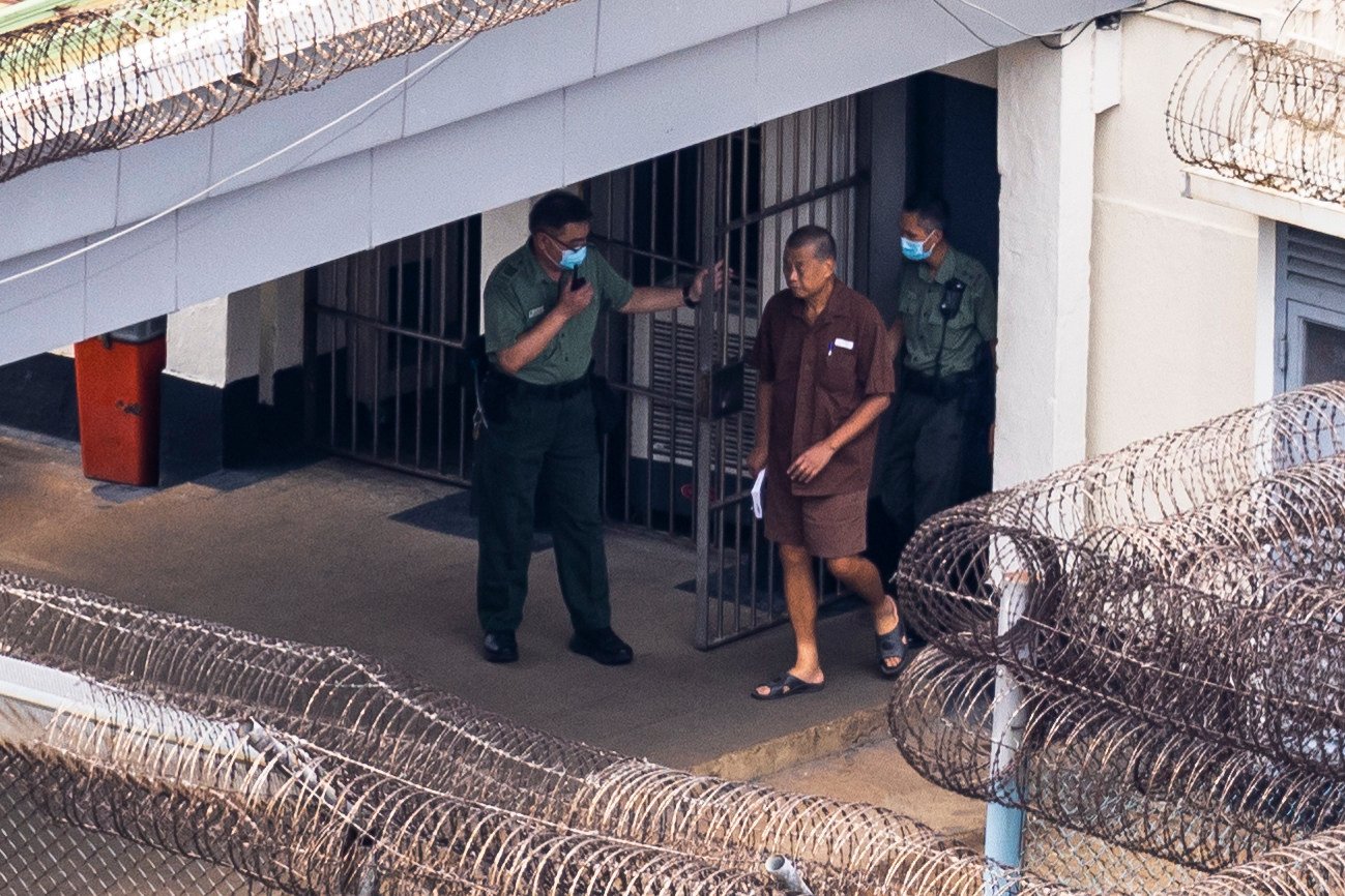 Publishing tycoon Jimmy Lai walks through Stanley Prison on July 28, 2023. Photo: AP 